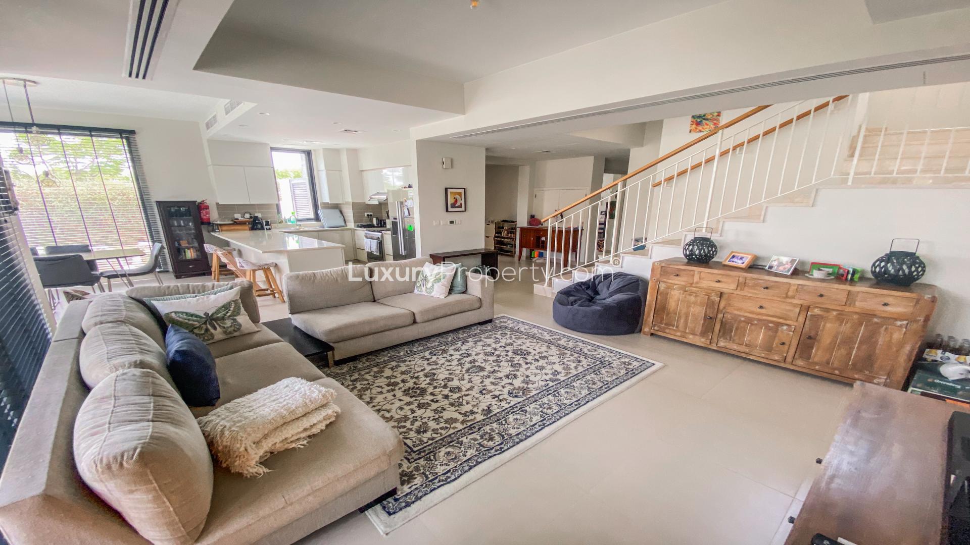 Modern 5-bedroom villa exterior in Maple at Dubai Hills Estate with garden view