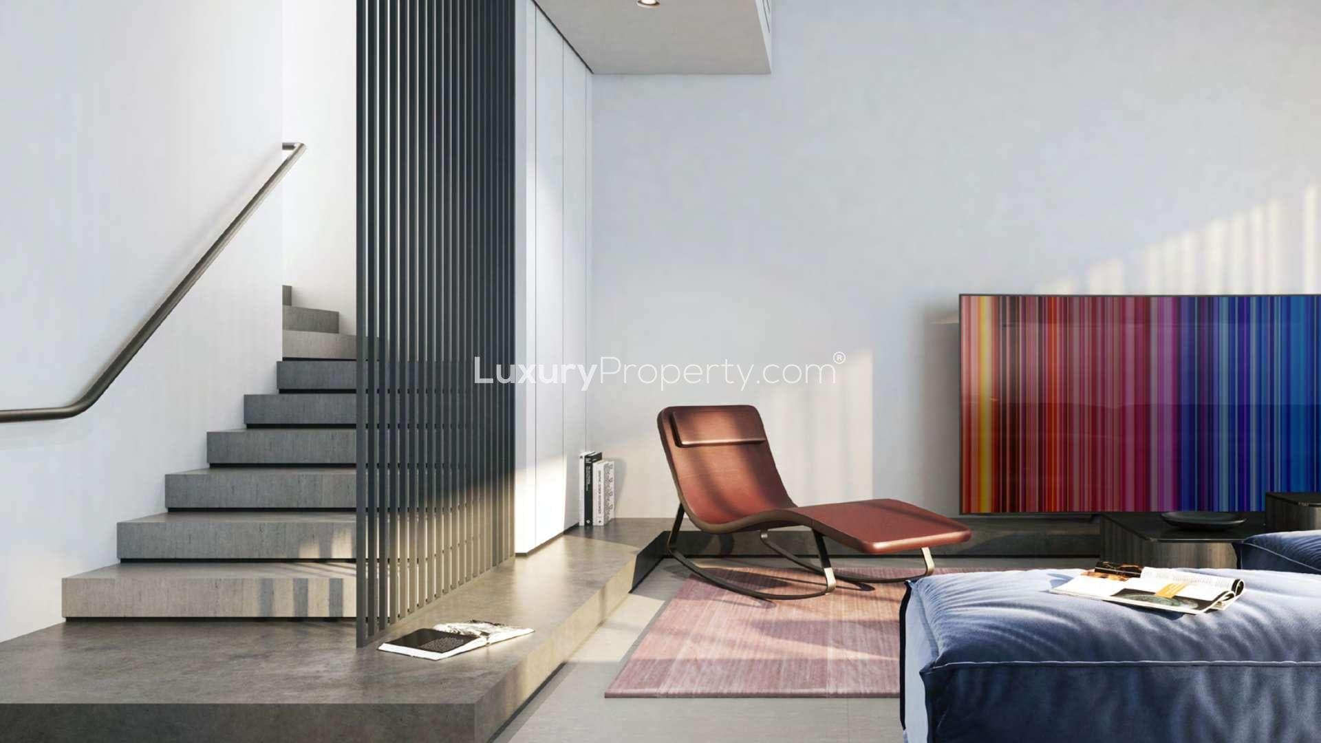 Modern 5-bedroom villa exterior in Jouri Hills, Jumeirah Golf Estates, for sale by 2026