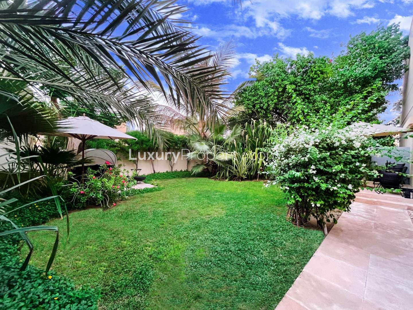 Spacious 5-bedroom villa exterior with driveway in Meadows 3, Emirates Living for sale
