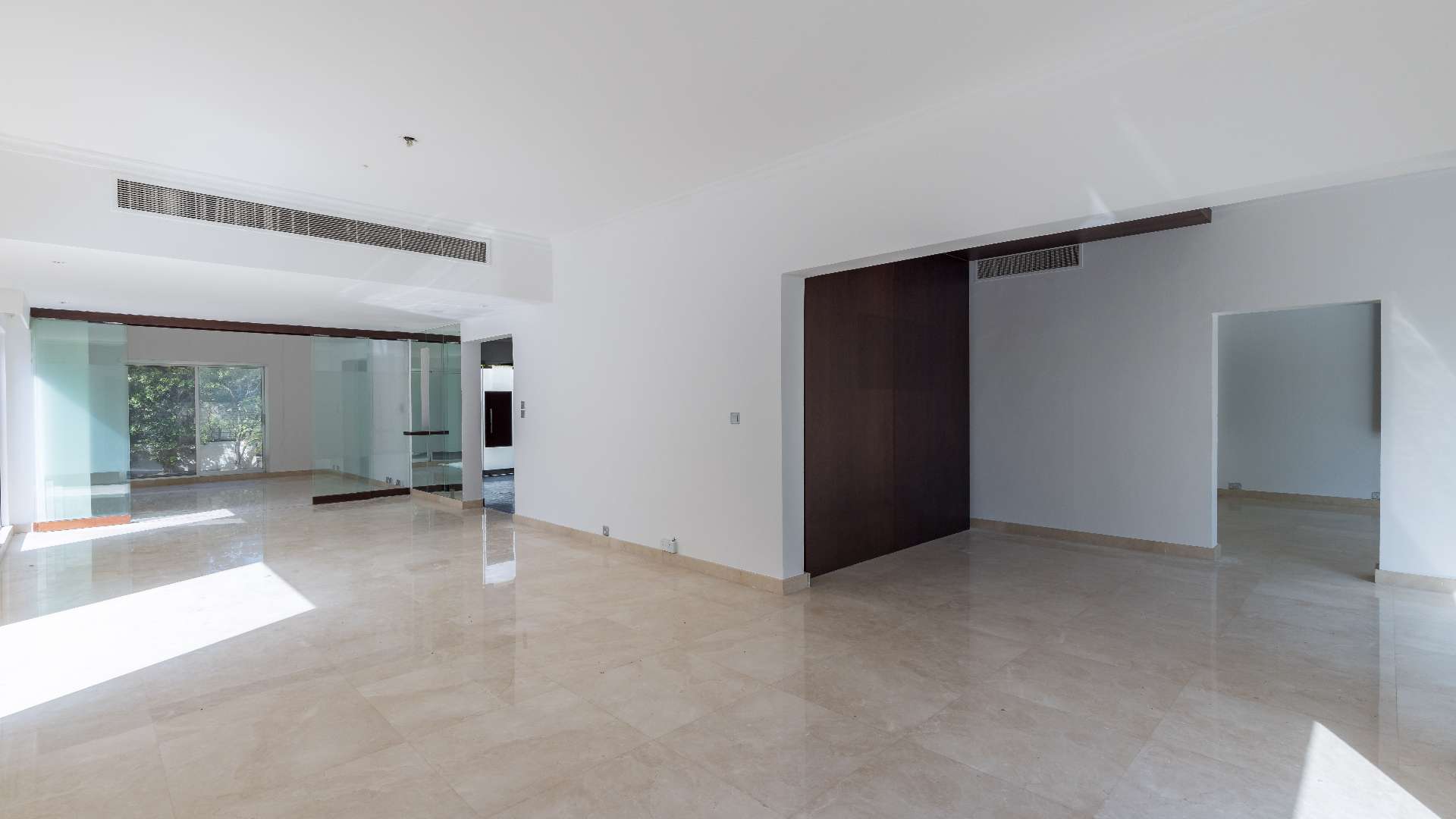 Upgraded Meadows villa entrance with modern glass doors and landscaped garden, LP09399 for sale