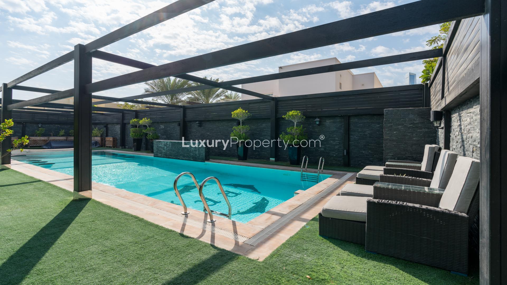 Luxurious villa with private pool, upgraded features, and spacious outdoor area in Meadows 2