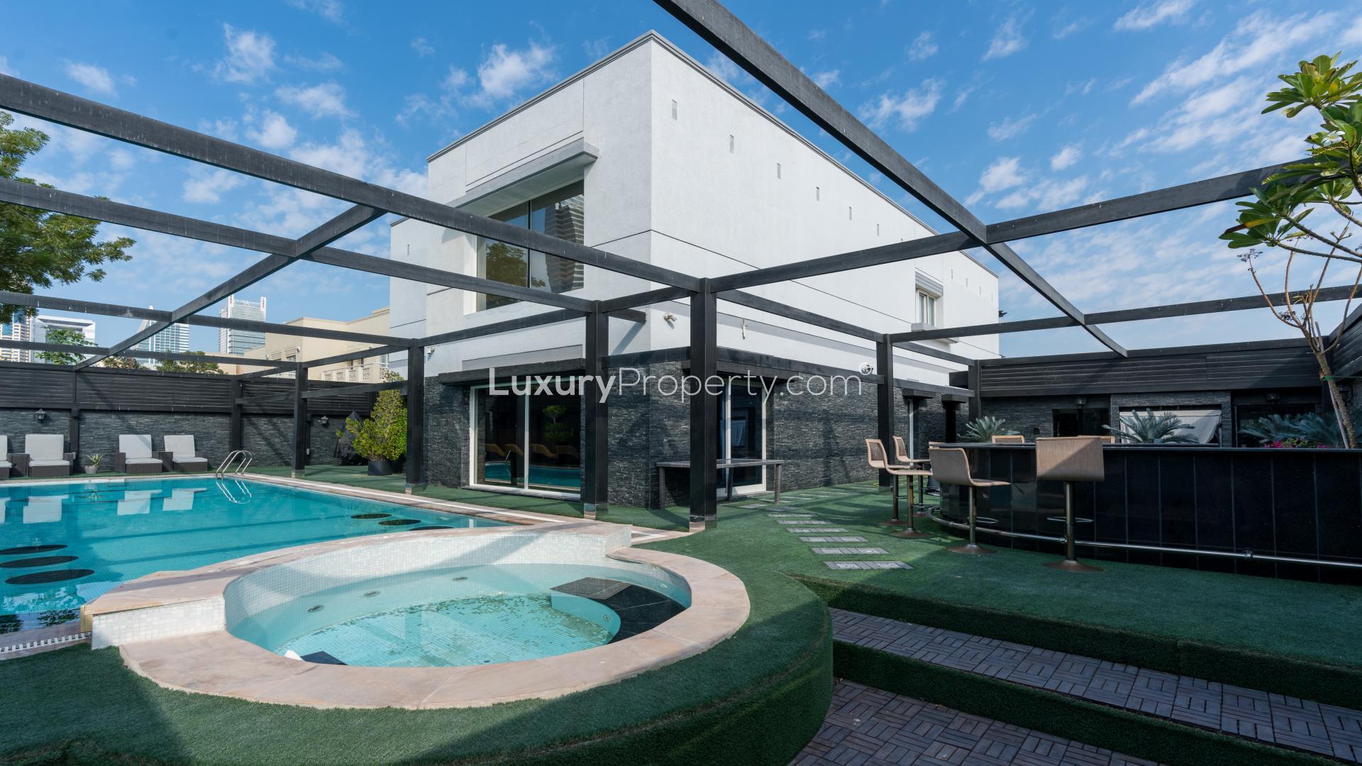 Luxury villa in Meadows 2 with private pool and modern outdoor seating area