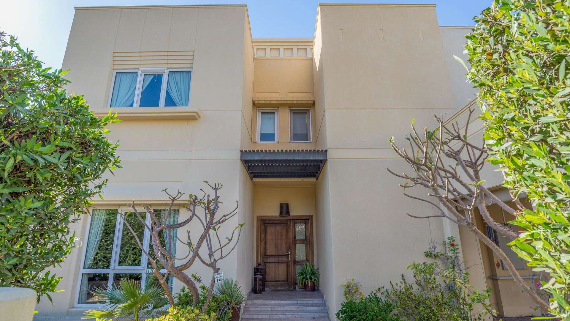 Family villa exterior with private garage in Meadows 1, Emirates Living for sale