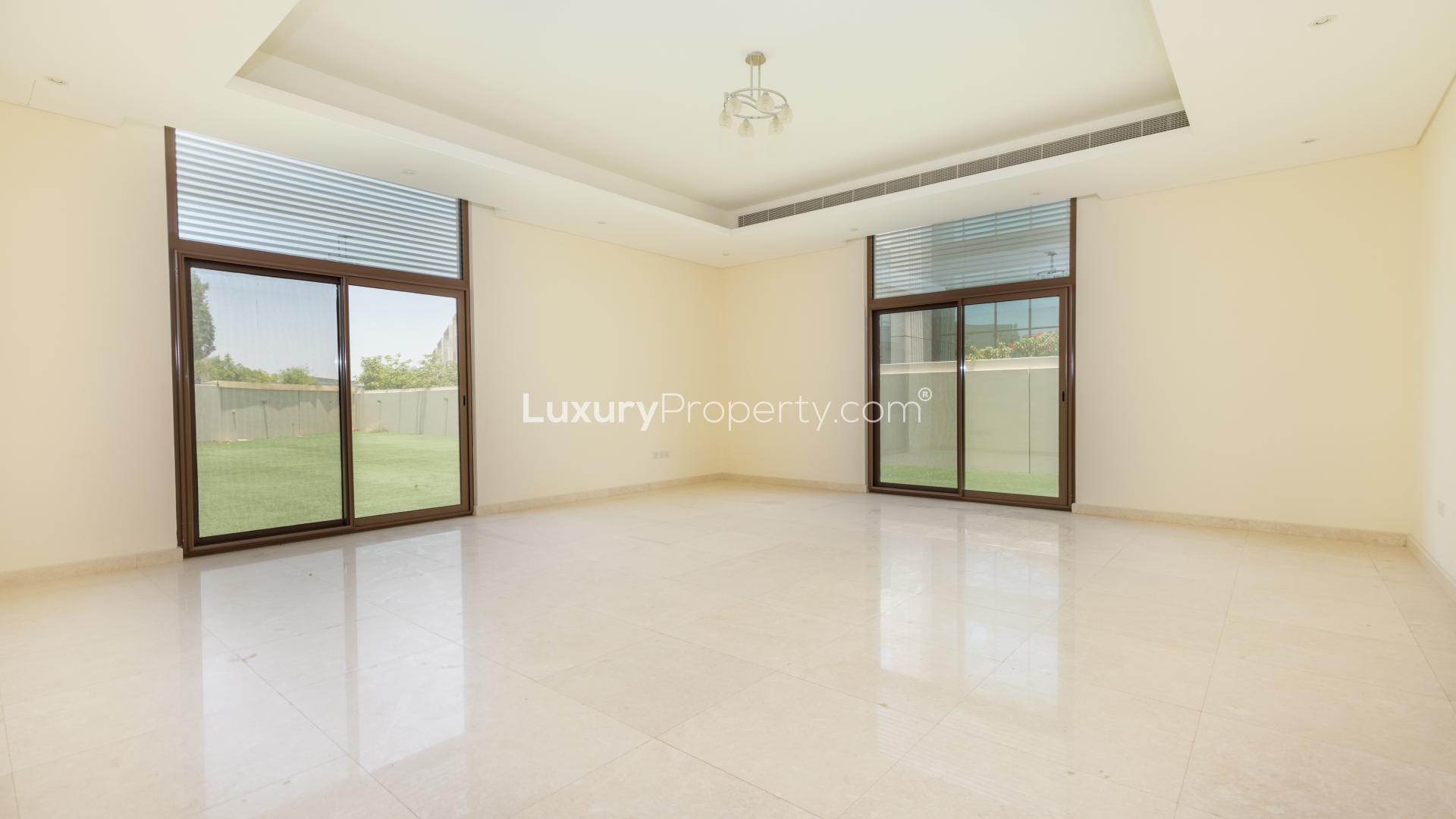 N/A,"Spacious living area in 5-bedroom villa, Millennium Estates, Meydan, available for rent.",Modern kitchen in 5-bedroom villa, Millennium Estates, Meydan Gated Community, available for rent
