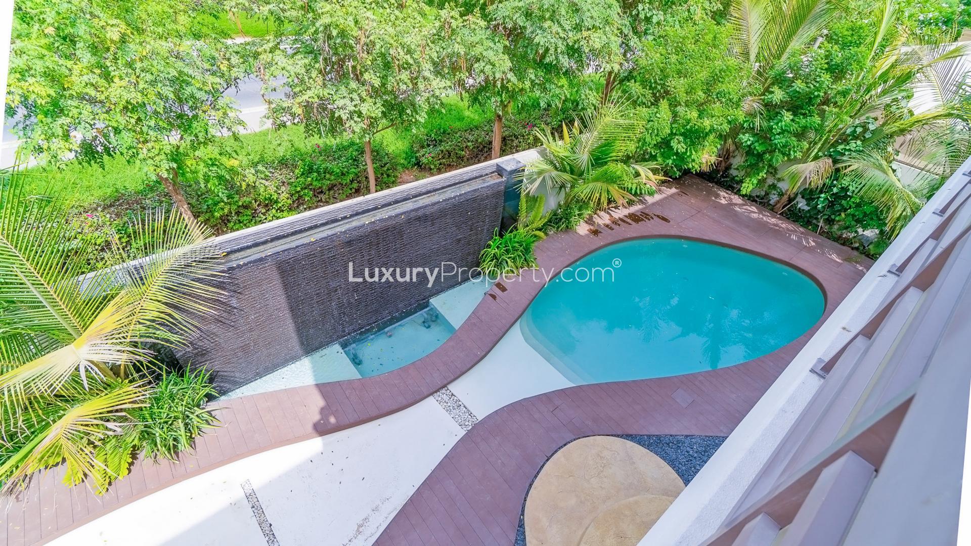 N/A,Luxurious villa pool with lush greenery in Meydan Gated Community, Dubai