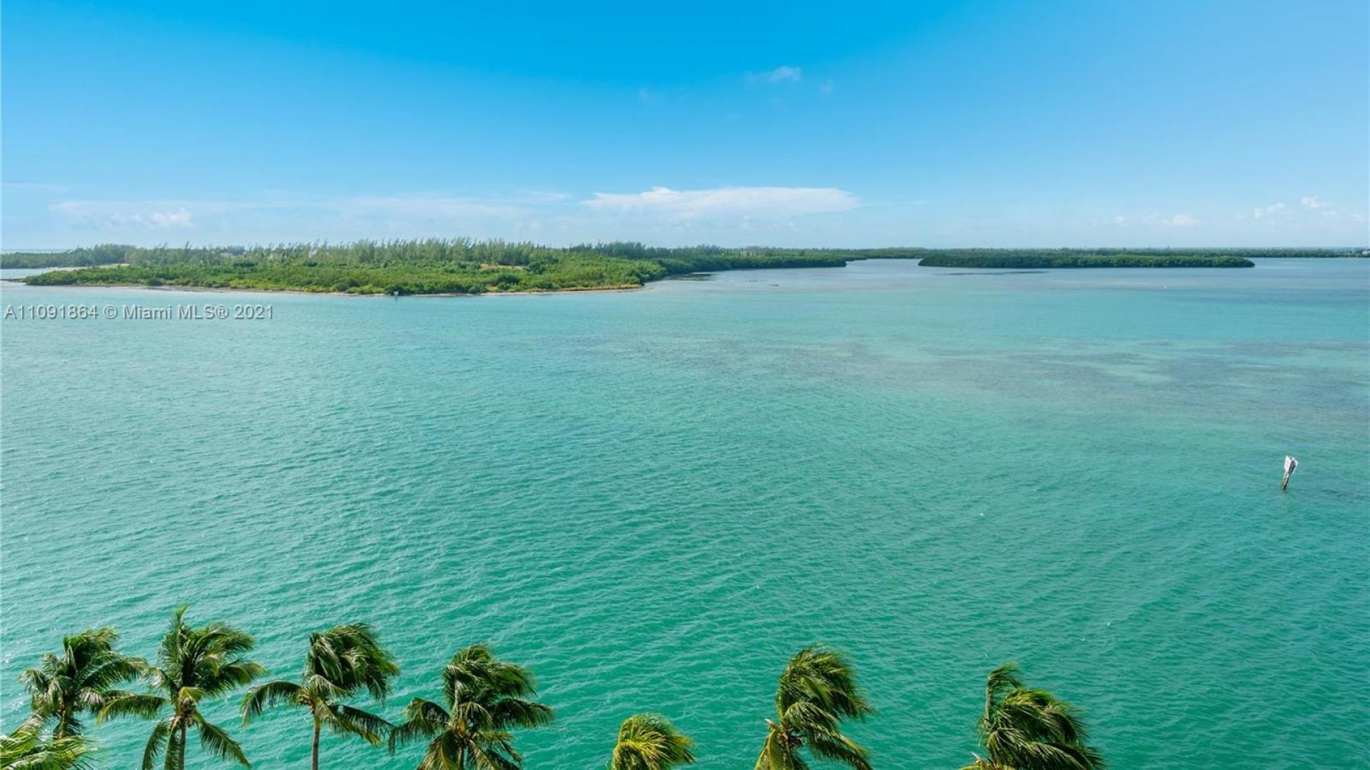 Aerial view of Miami skyline and ocean near 5282 Fisher Island Dr villa for sale