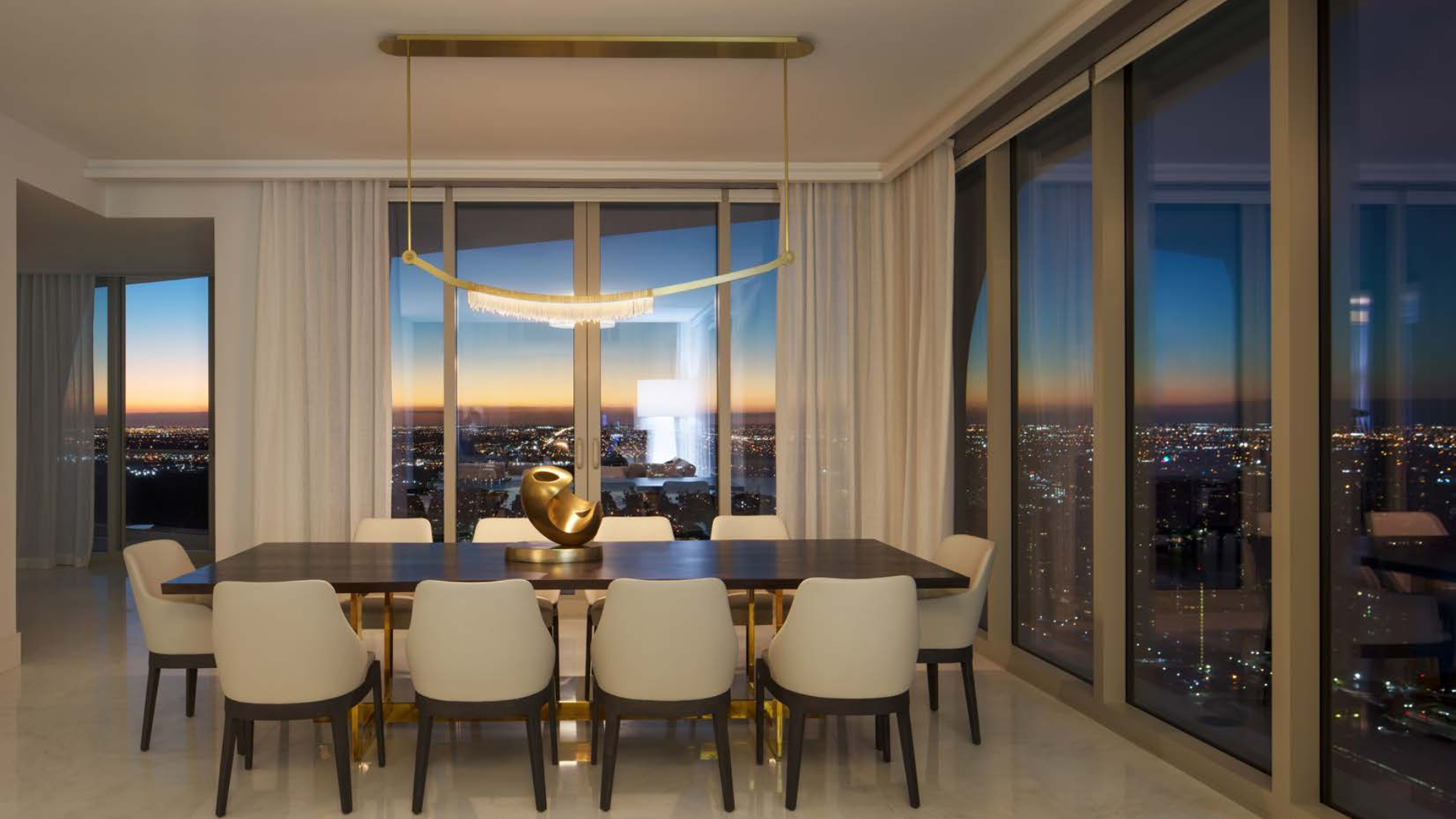 Elegant dining area with ocean views in Miami coastline villa for sale