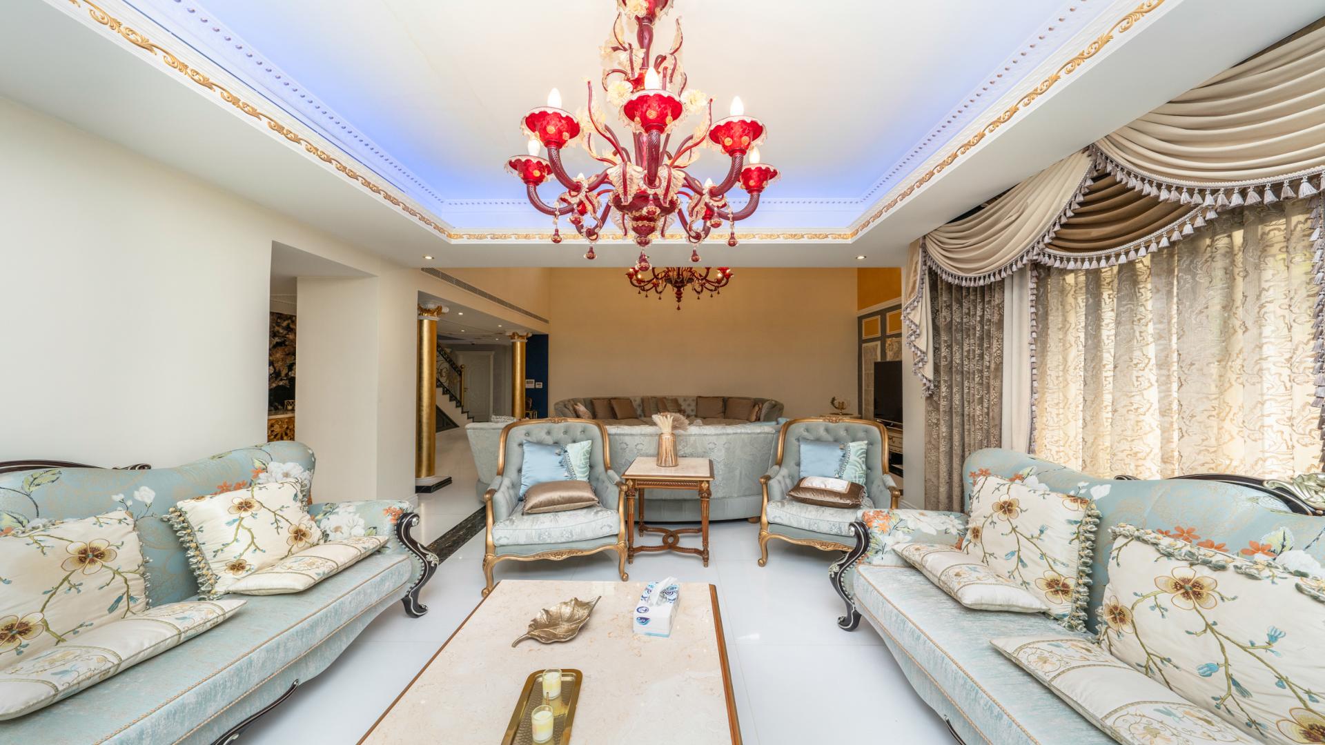 Luxurious 5-bedroom villa exterior in Mirador, Arabian Ranches, with spacious garden and patio