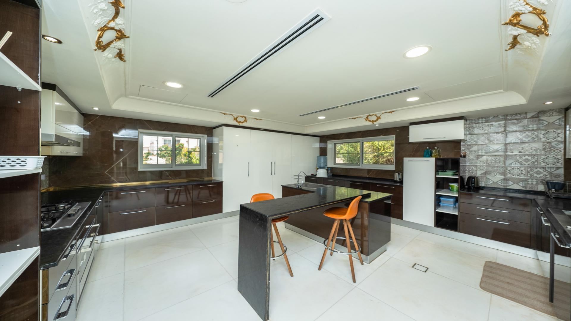 Luxurious living room in 5-bedroom villa, Mirador, Arabian Ranches, elegant furnishings and chandelier