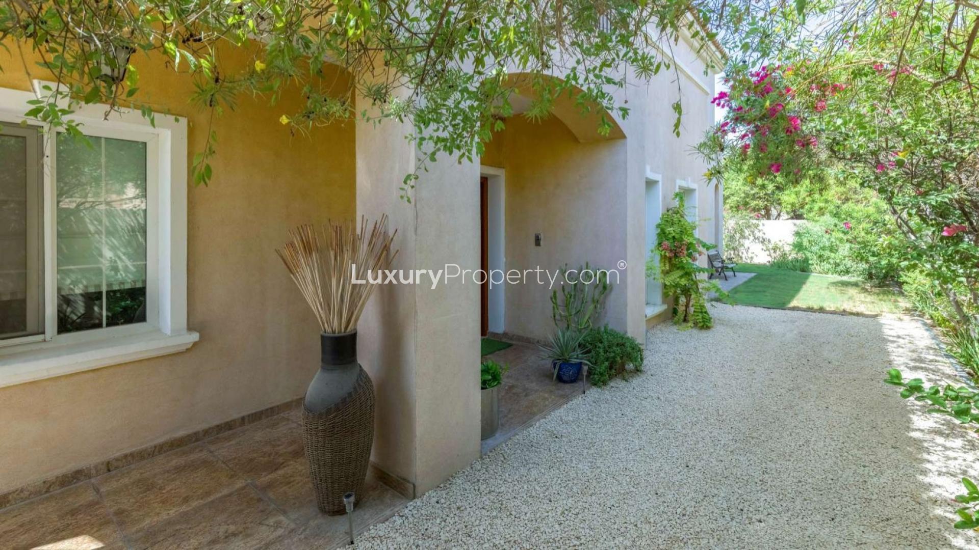 Bathroom with tub and colorful curtain in Mirador luxury villa, Arabian Ranches