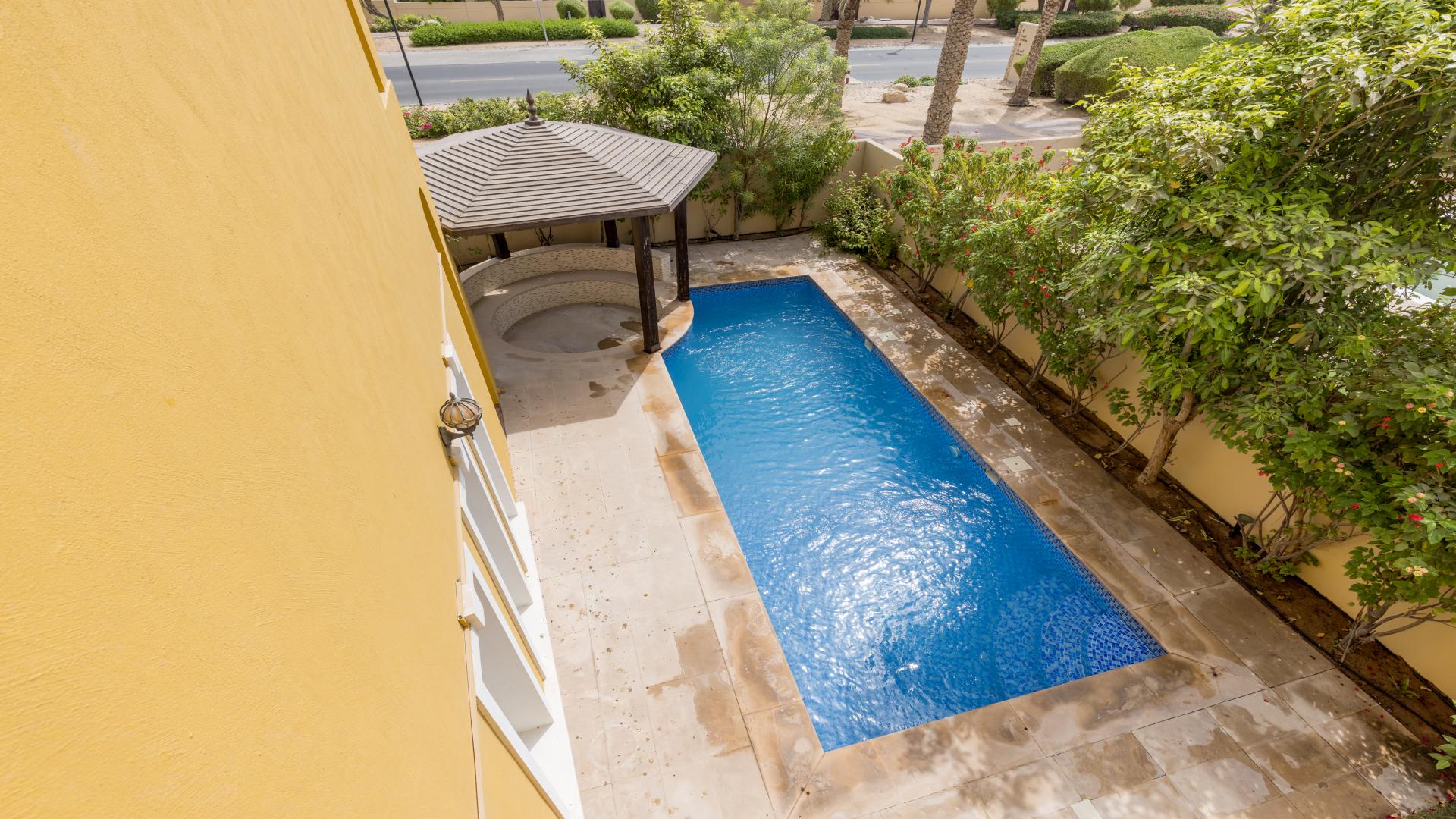 Spacious living room in 5-bedroom villa, Mirador, Arabian Ranches, with modern ceiling design