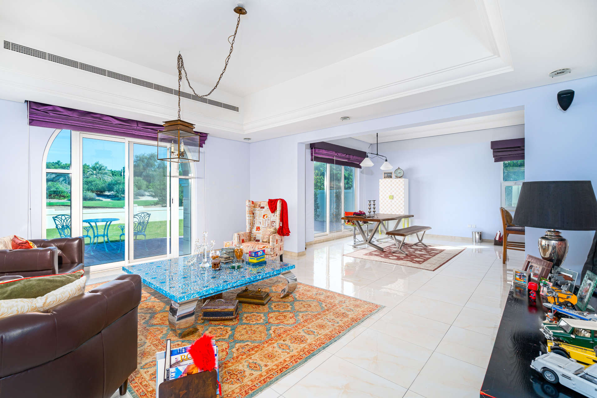 Walk-in closet leading to en-suite bathroom in Victory Heights villa, Dubai