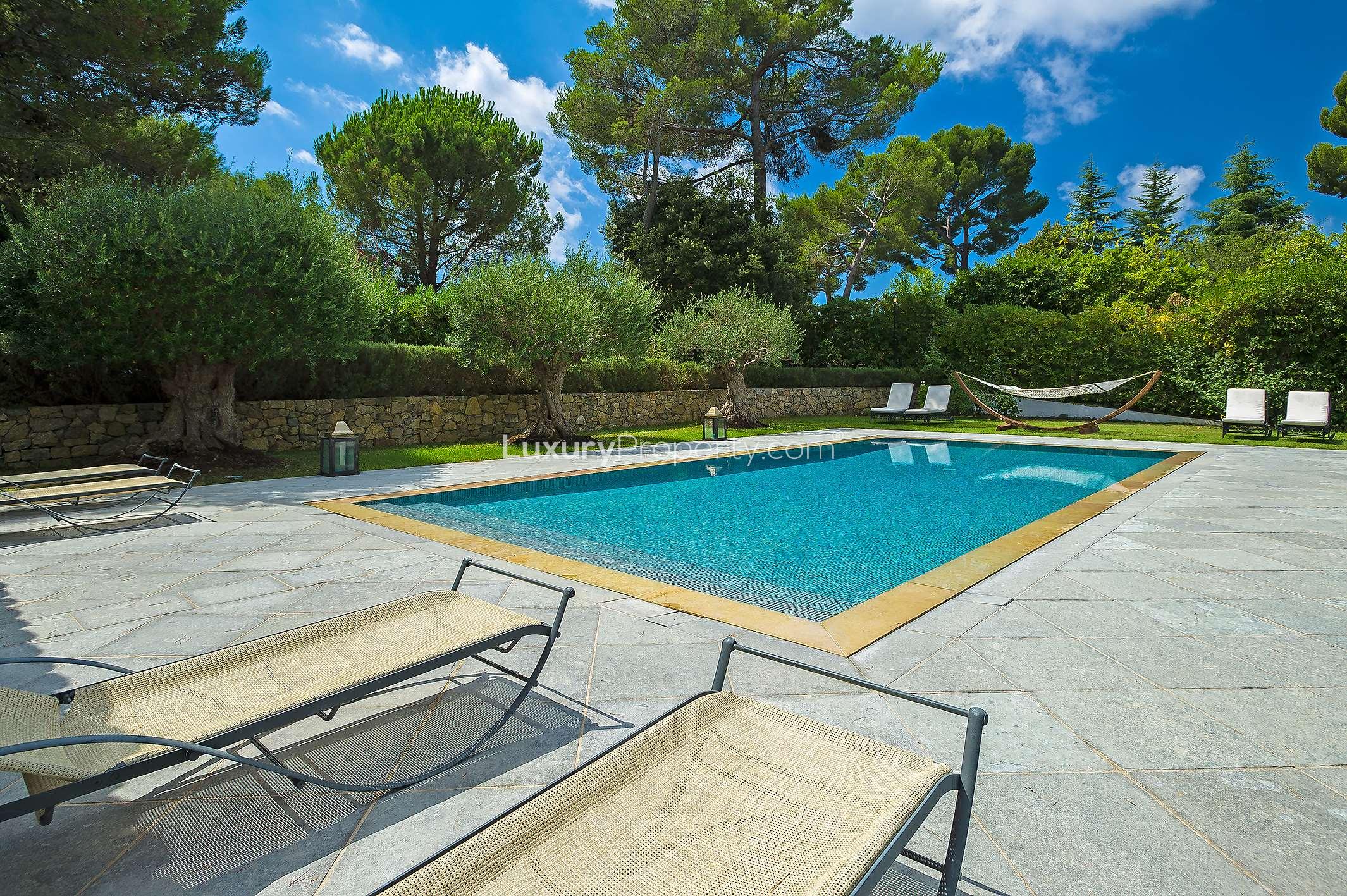 N/A,Luxurious villa poolside with loungers and hammock, Mougins, French Riviera