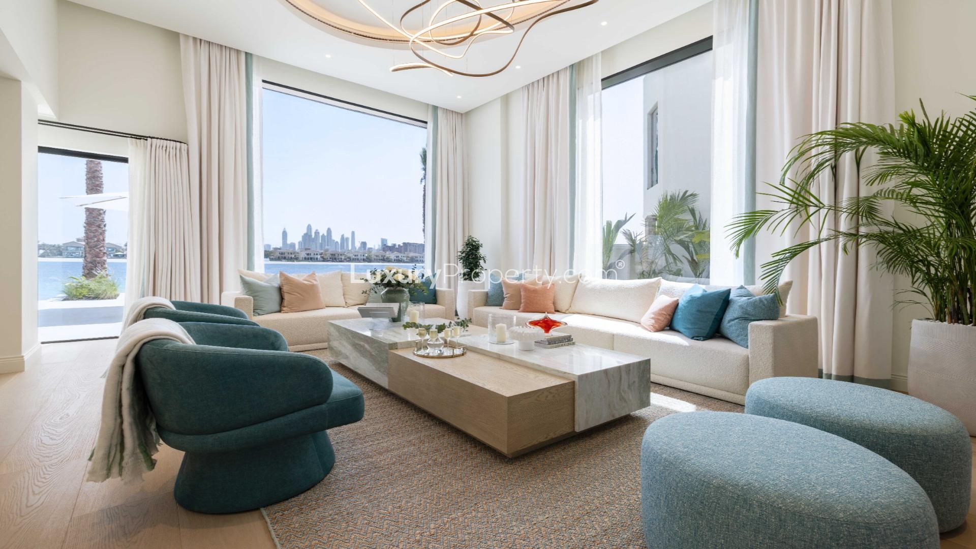 Exquisite 5-bedroom renovated villa exterior on Palm Jumeirah, featuring modern design and luxury car