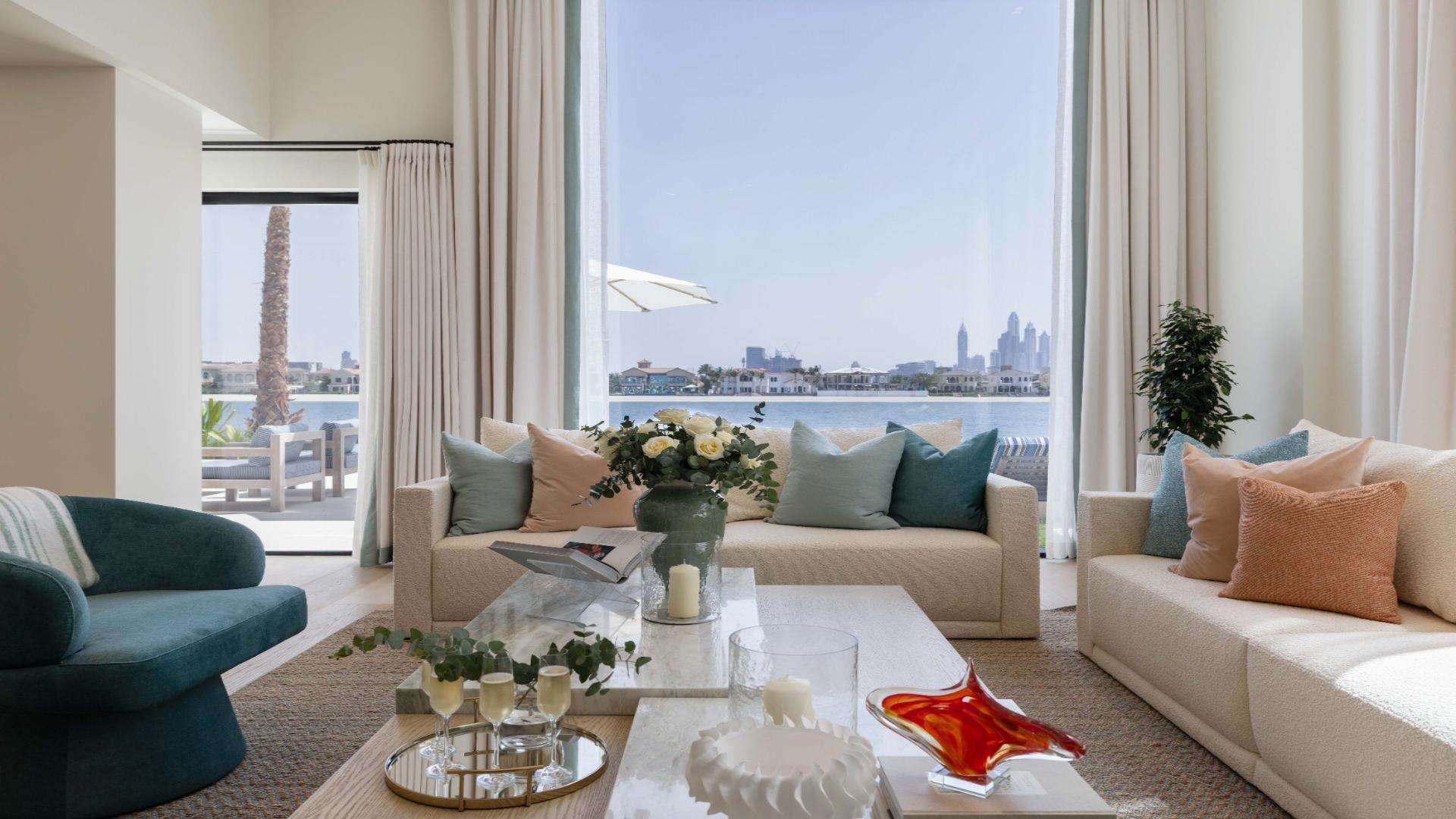 Luxurious living room in renovated Palm Jumeirah villa with stunning skyline views