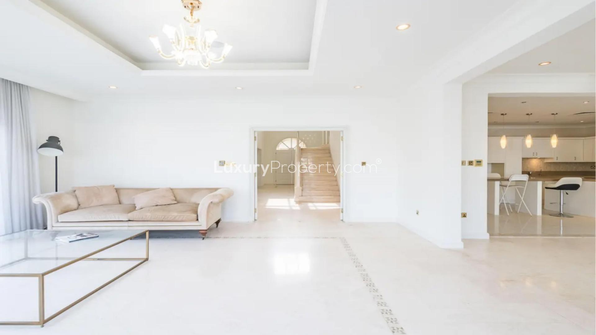 Elegant Palm Jumeirah villa with lush garden and spacious patio, perfect for luxury living