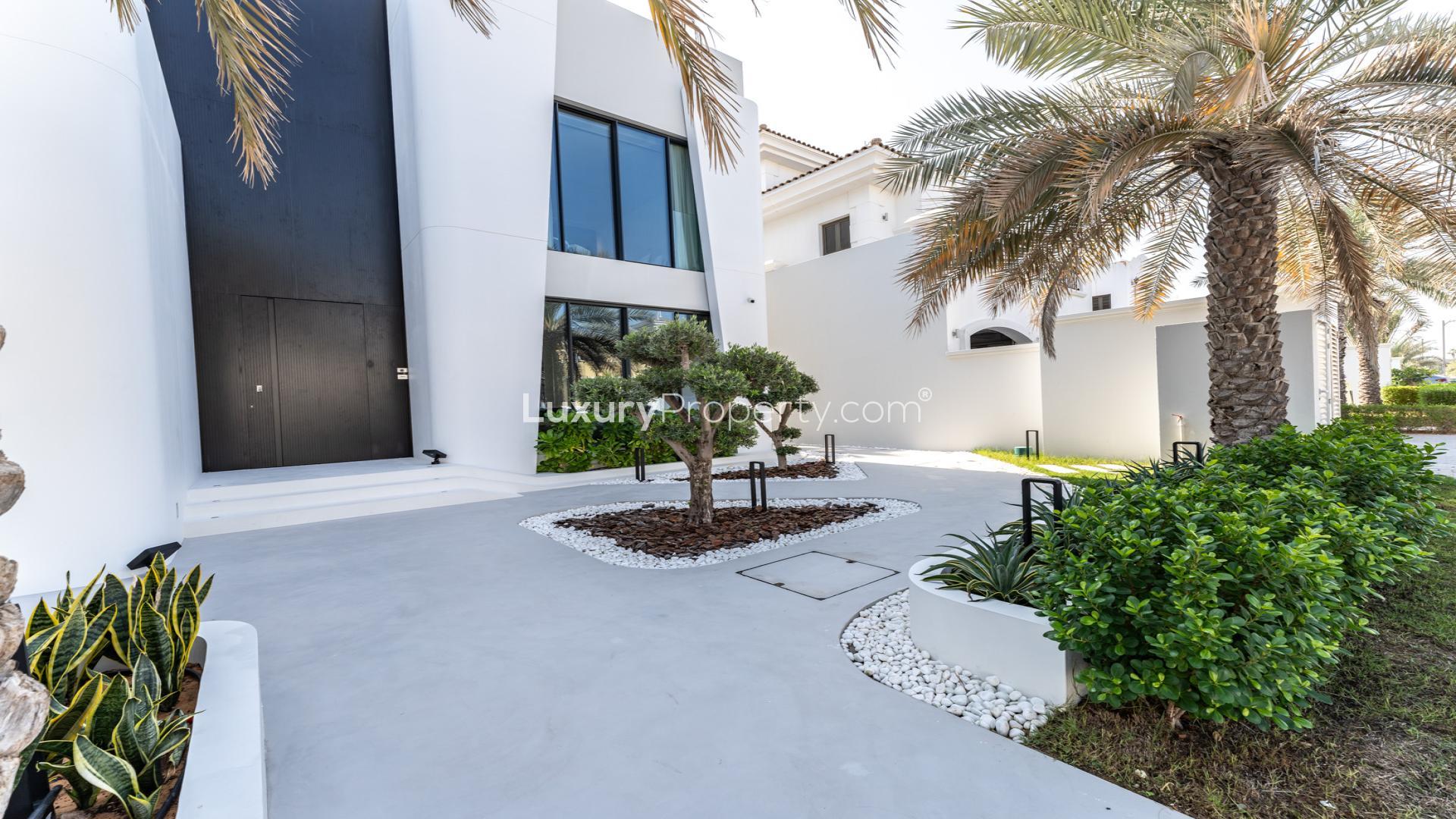 Bespoke 5-bedroom villa exterior with palm trees, Palm Jumeirah, Garden Homes, for sale