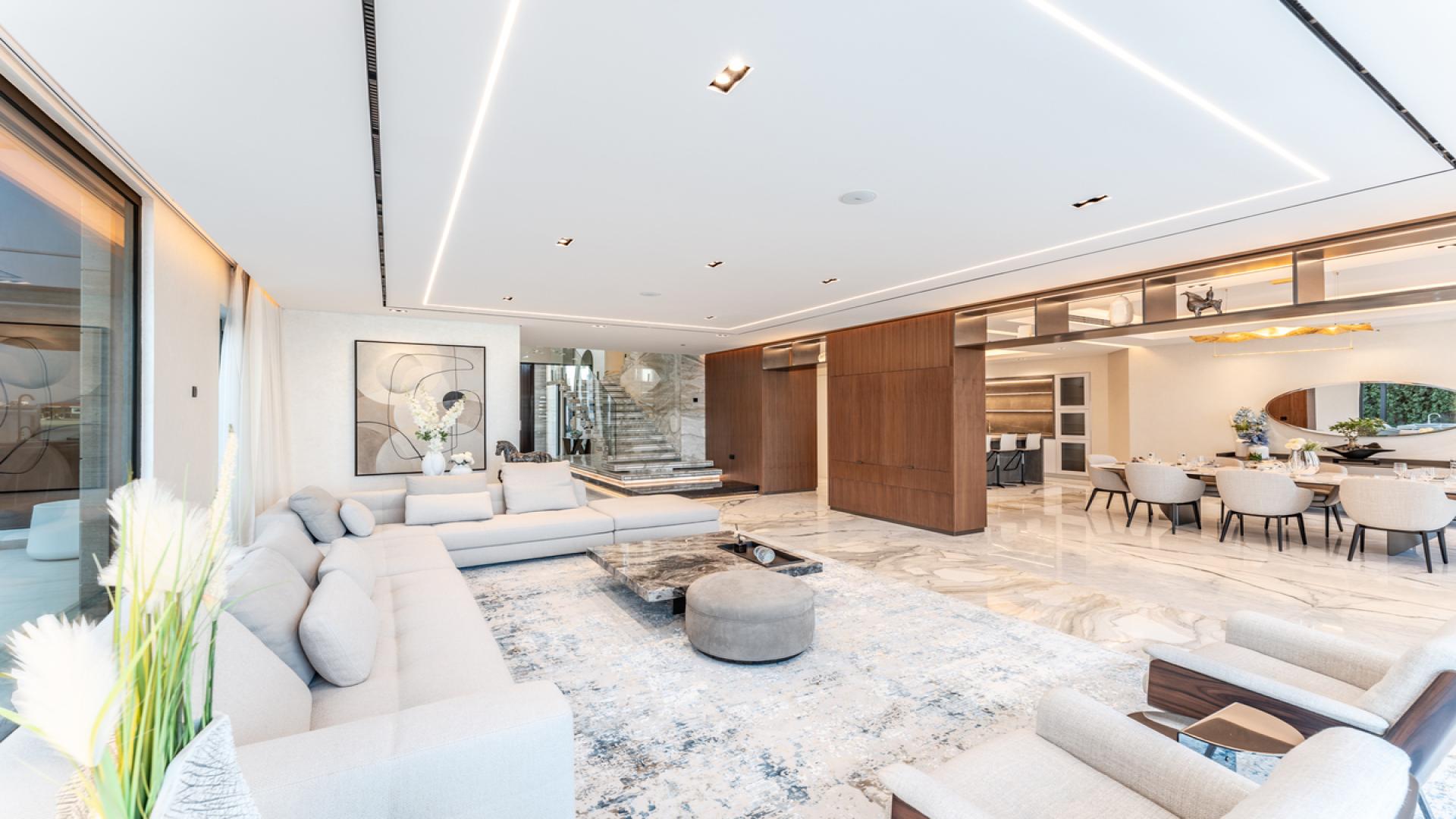 N/A,Luxurious living room in Palm Jumeirah villa with modern decor and elegant furnishings