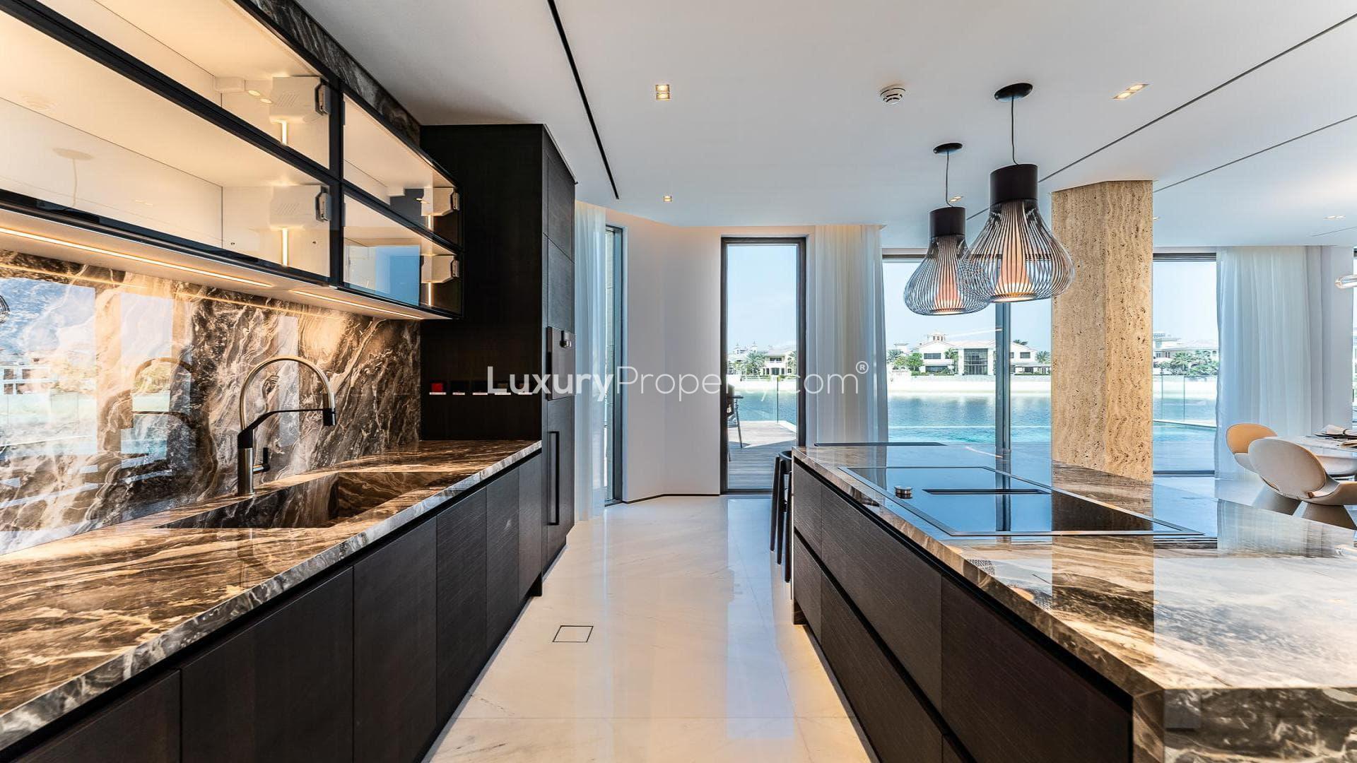 Luxurious living room in Palm Jumeirah villa with modern decor and waterfront view