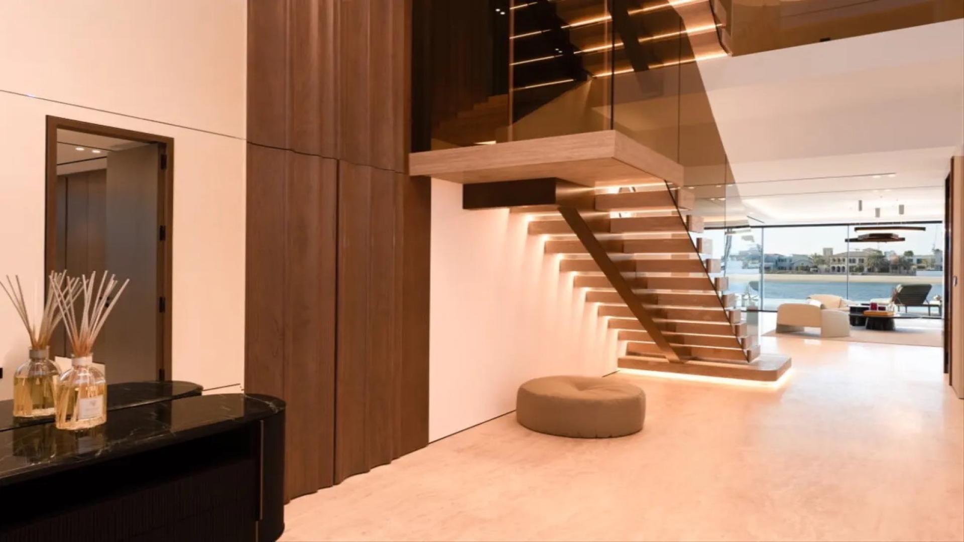 Modern living room in a luxury Palm Jumeirah villa, featuring elegant furniture and decor