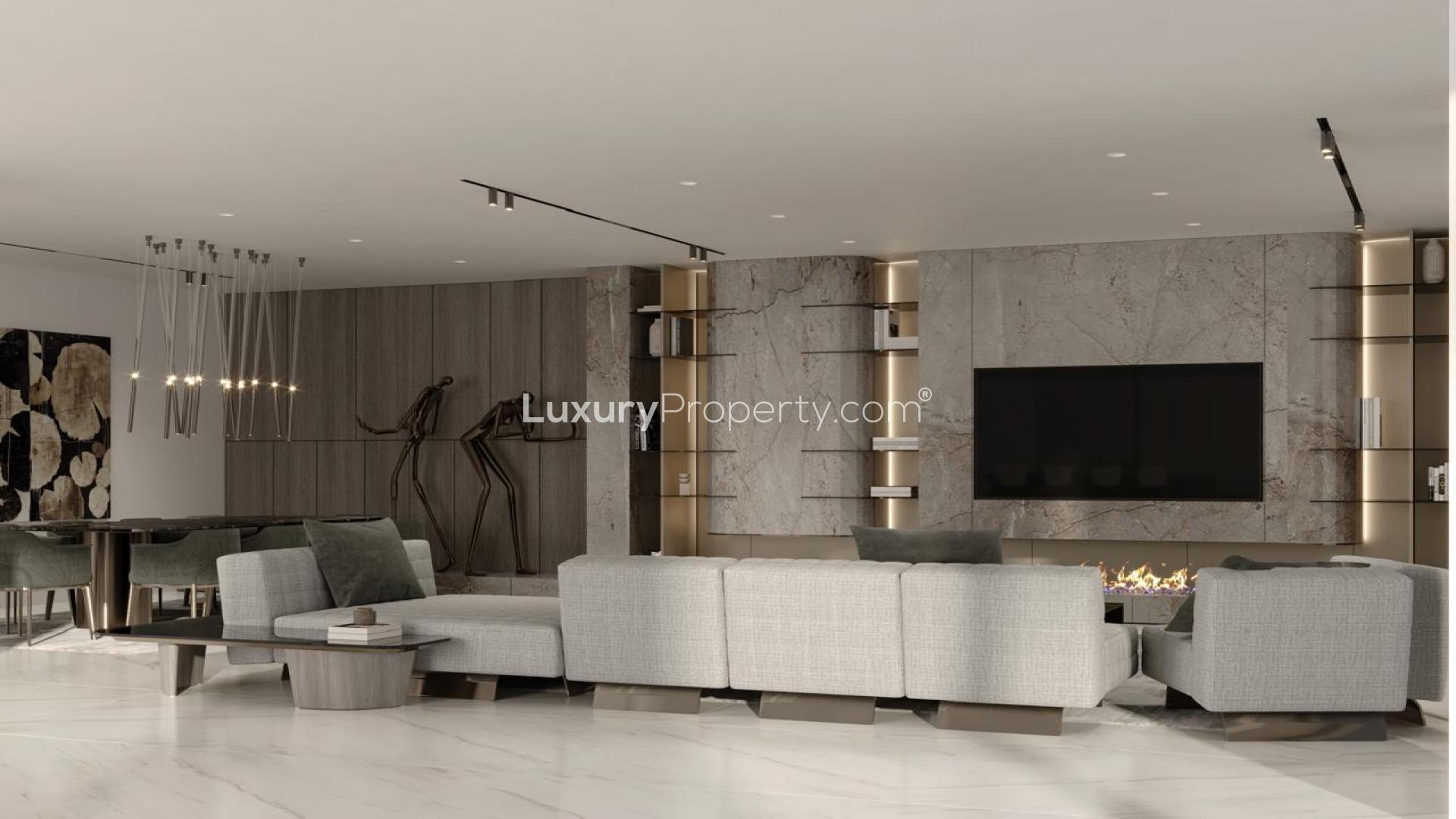 Modern kitchen design in luxury Palm Jumeirah villa, featuring sleek cabinetry and marble countertops