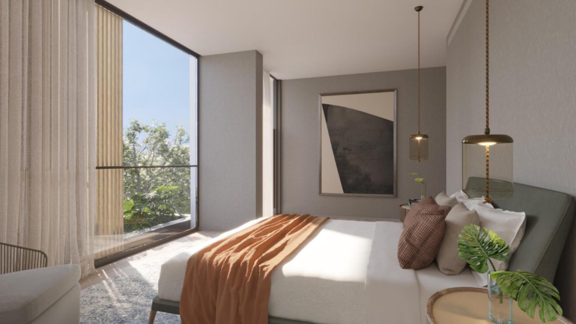 Luxurious living room in 5-bedroom villa, Nad Al Sheba Gardens, elegant decor and staircase