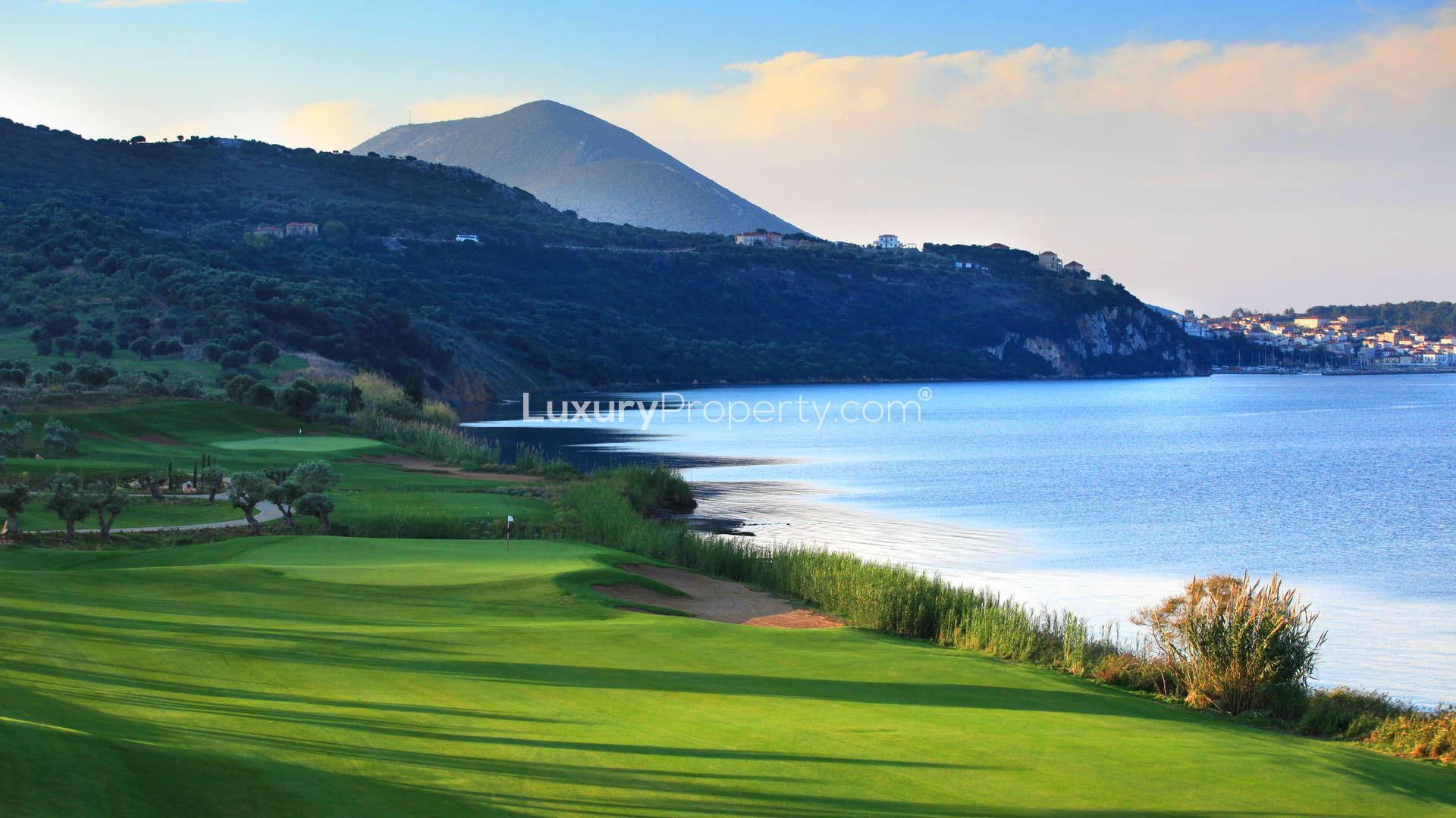 Luxurious villa patio with ocean view, pool, and seating in Navarino Residences, Greece