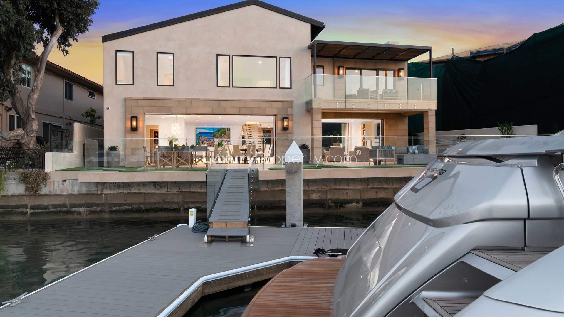 Luxurious living room with cozy fireplace in Newport Beach villa, California