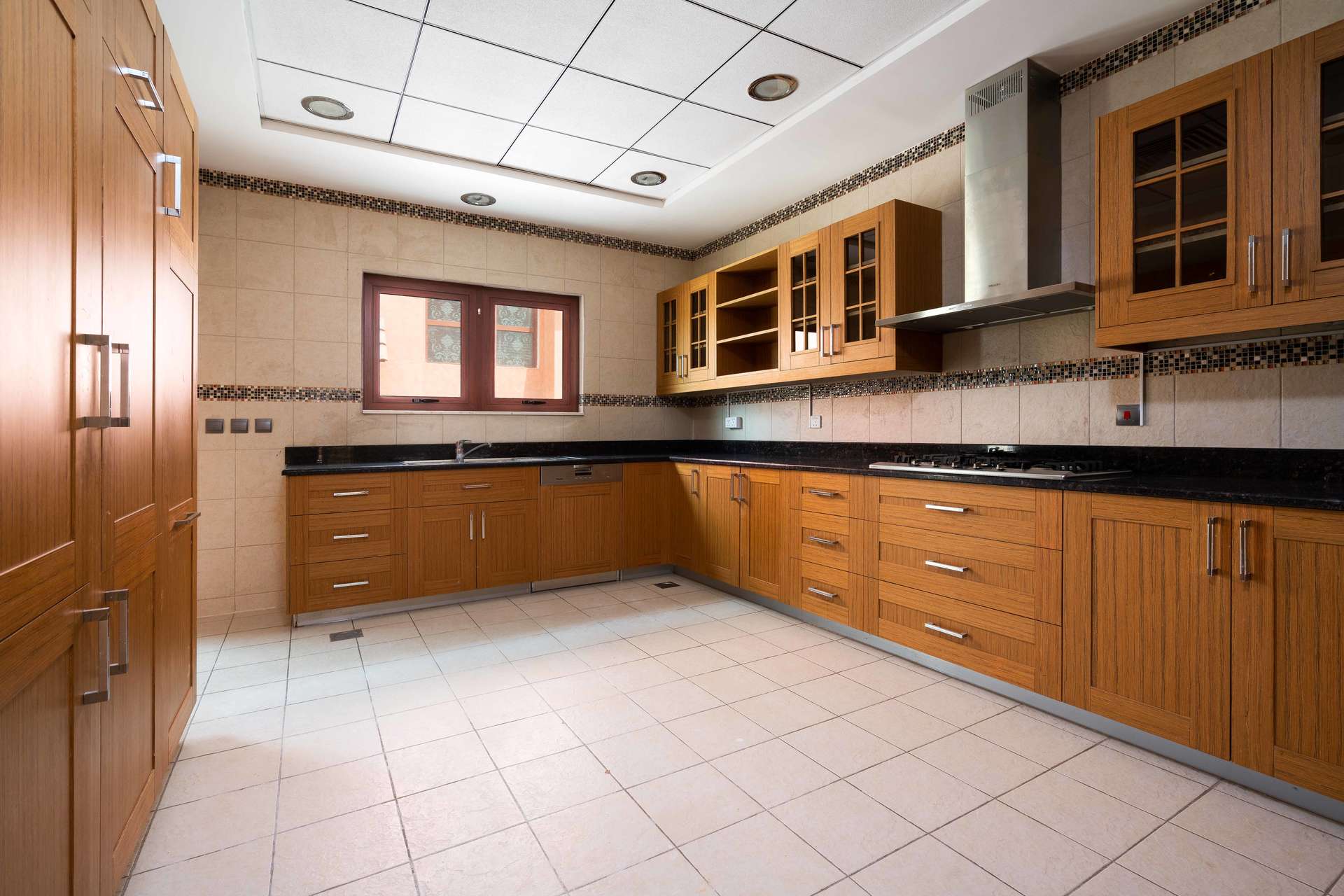 Spacious room with large windows in Jumeirah Golf Estates villa for sale, Orange Lake