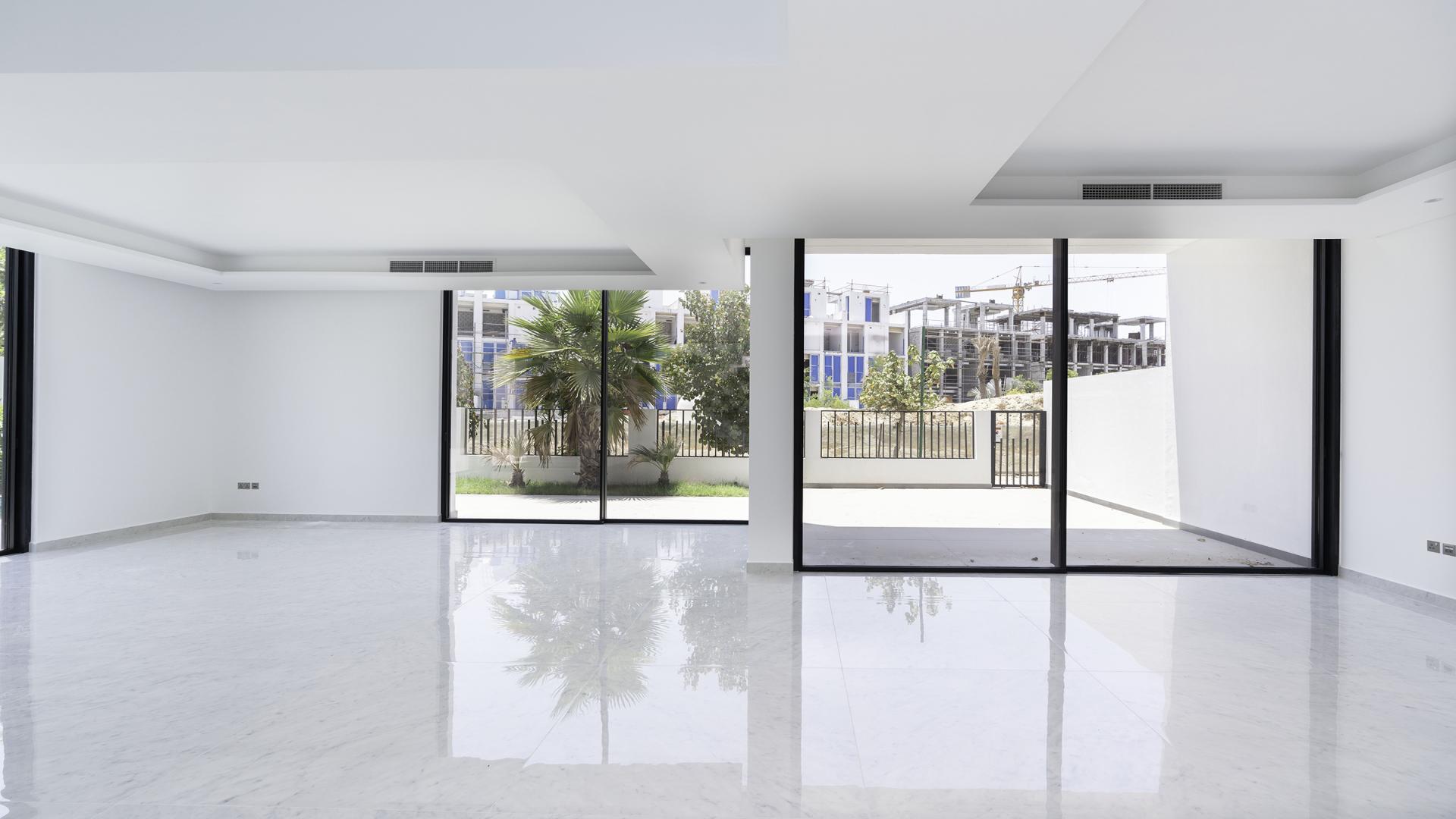 Modern kitchen in elegant 5-bedroom villa for sale in Al Barari, Chorisia 2