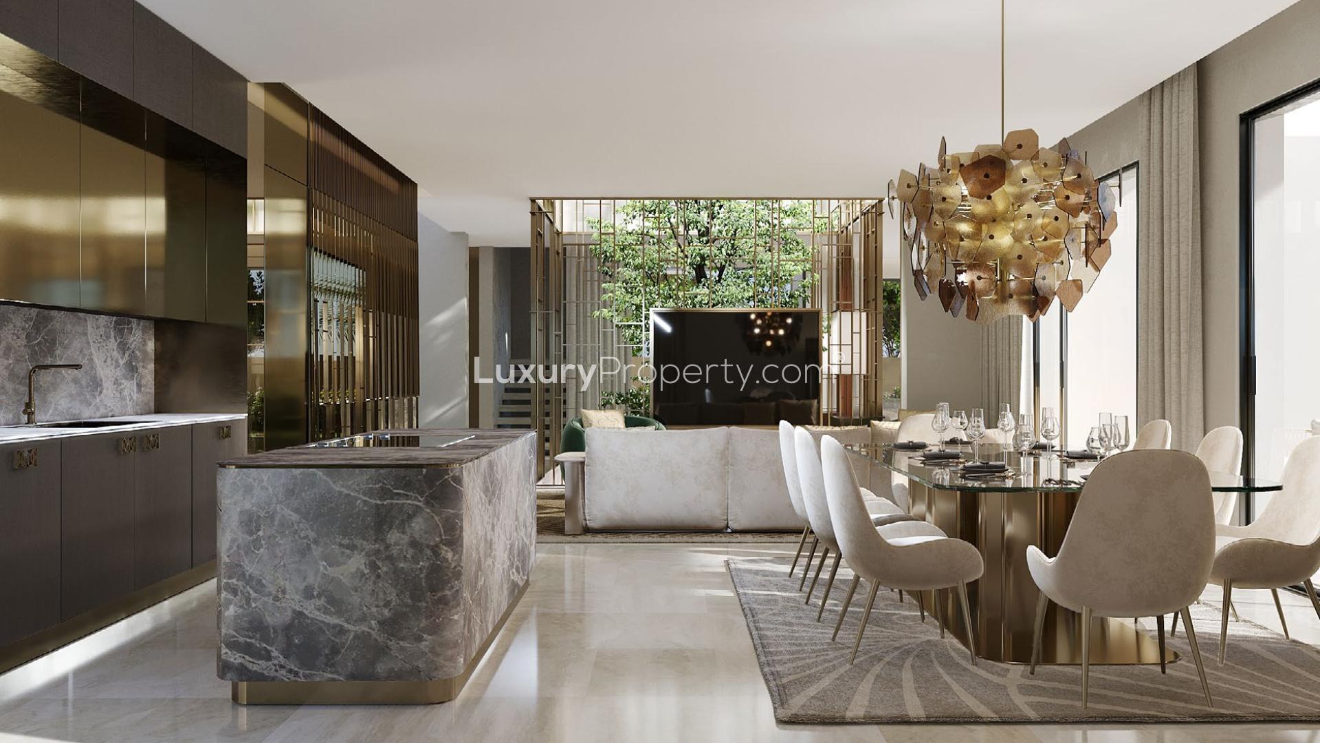Luxurious open-plan kitchen and dining area in Dubai Hills Estate villa for sale