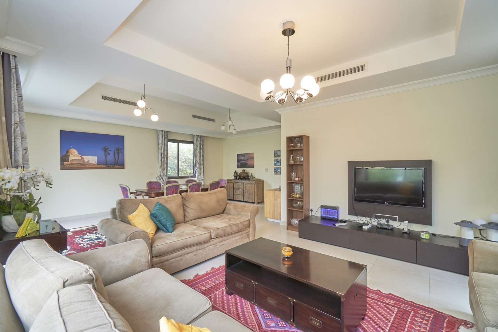 Living room of five-bedroom villa in Palma, Arabian Ranches 2, with cozy seating area