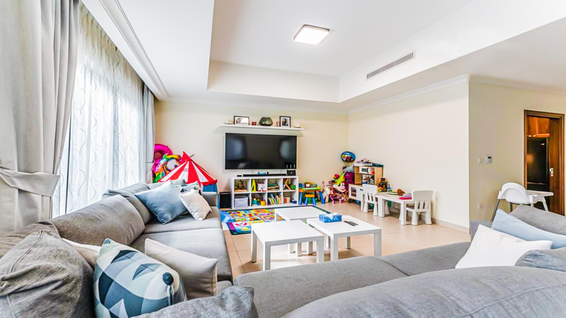 Bright living area in spacious villa, Palma, Arabian Ranches 2, featuring modern furniture