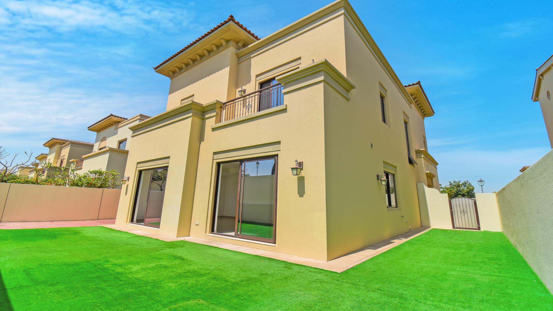 Exterior view of spacious villa with green lawn in Palma, Arabian Ranches 2 community