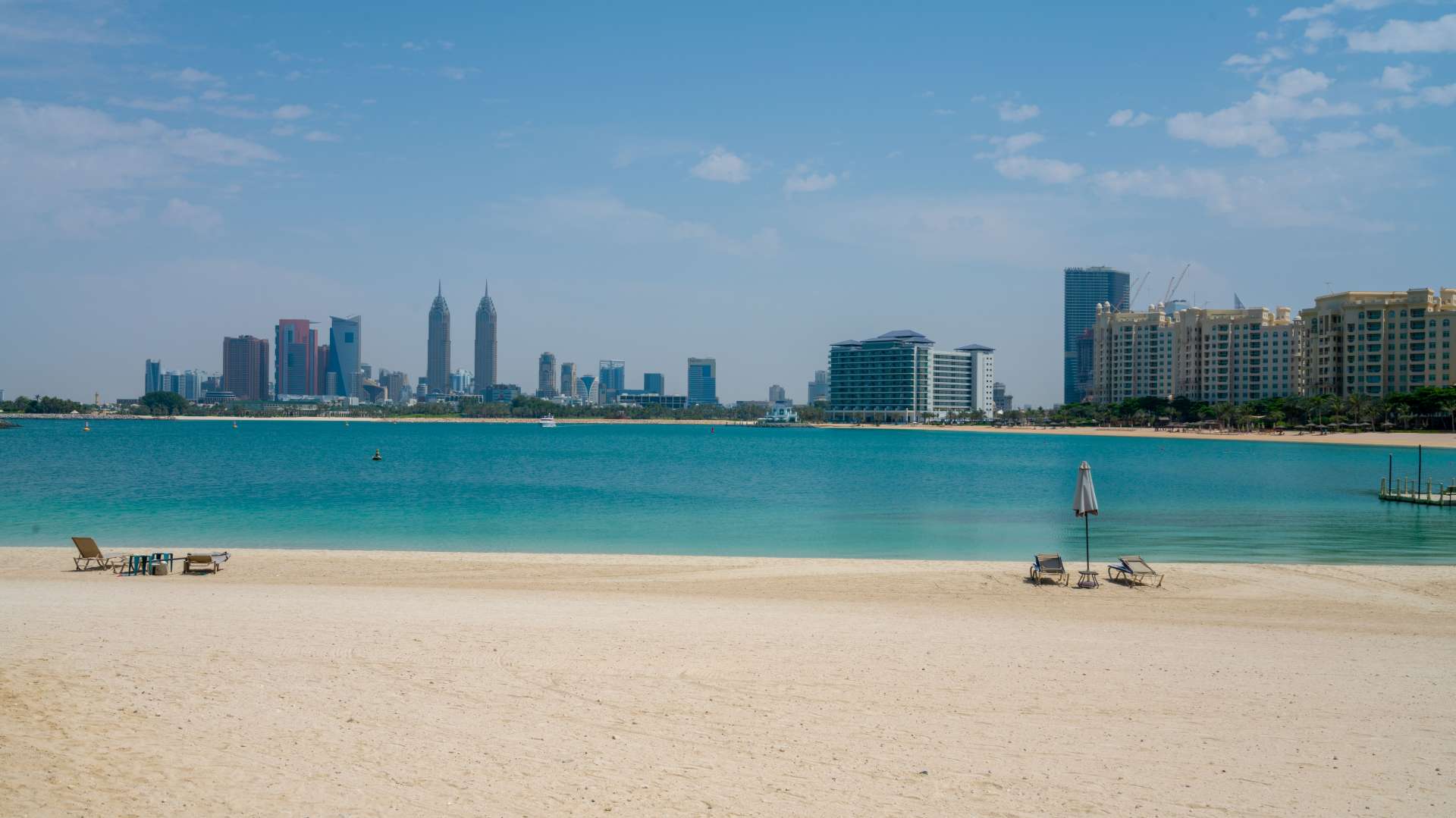 Beachfront view from Palma Residences townhouse, Palm Jumeirah, showcasing serene sea and skyline
