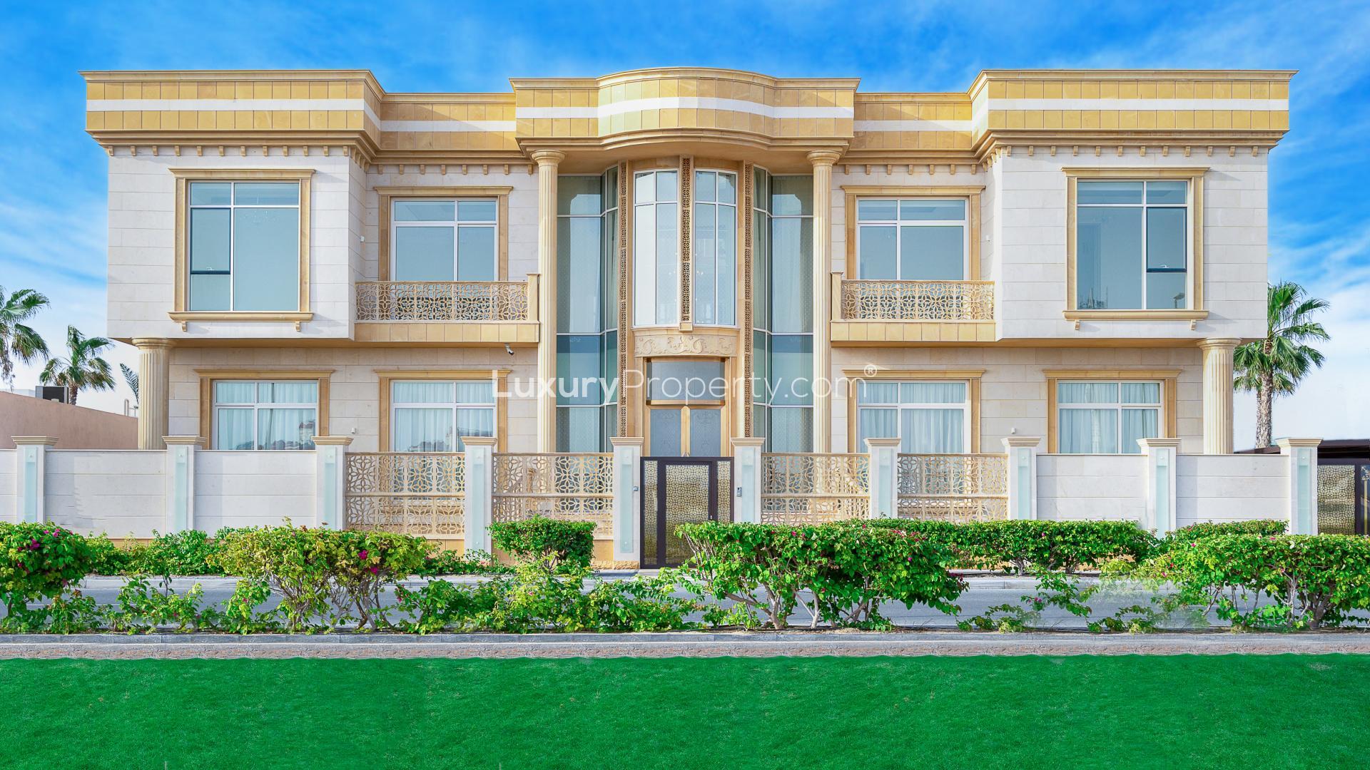 Luxurious marble staircase in Pearl Jumeirah villa with elegant chandelier and intricate designs