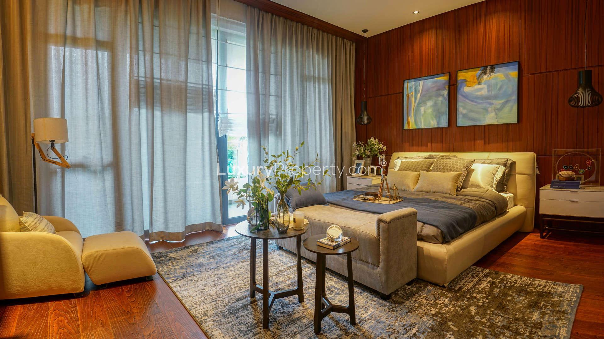 Sophisticated living room in five-bedroom Pearl Villa, Forest City, Malaysia, with modern decor