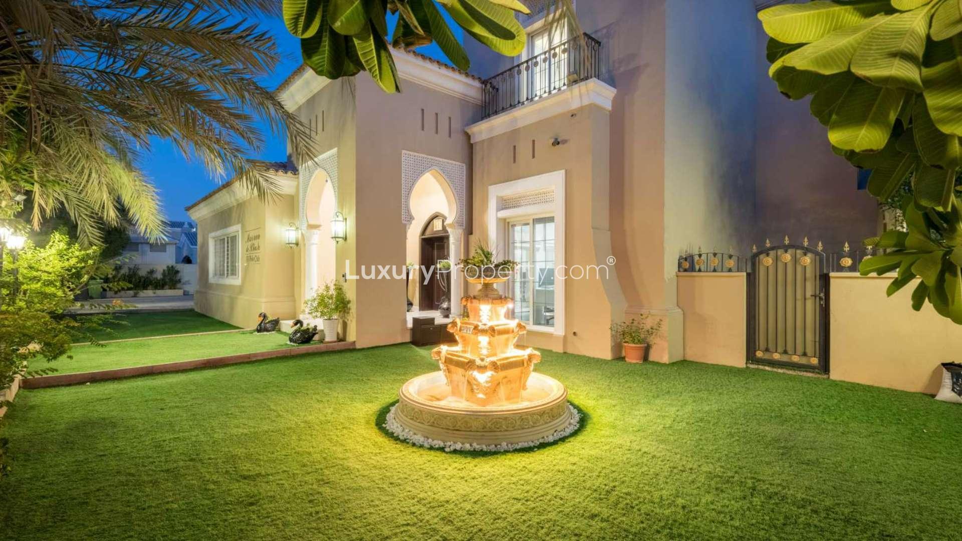 N/A,Luxurious villa exterior with illuminated fountain in Arabian Ranches, Polo Homes community