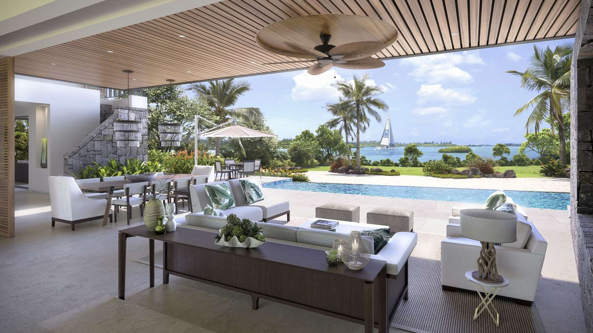 "Luxurious open-plan living room and dining area in Anahita Mauritius Premium Villa.",Luxurious open-plan villa with pool and ocean view at Anahita Mauritius Resort