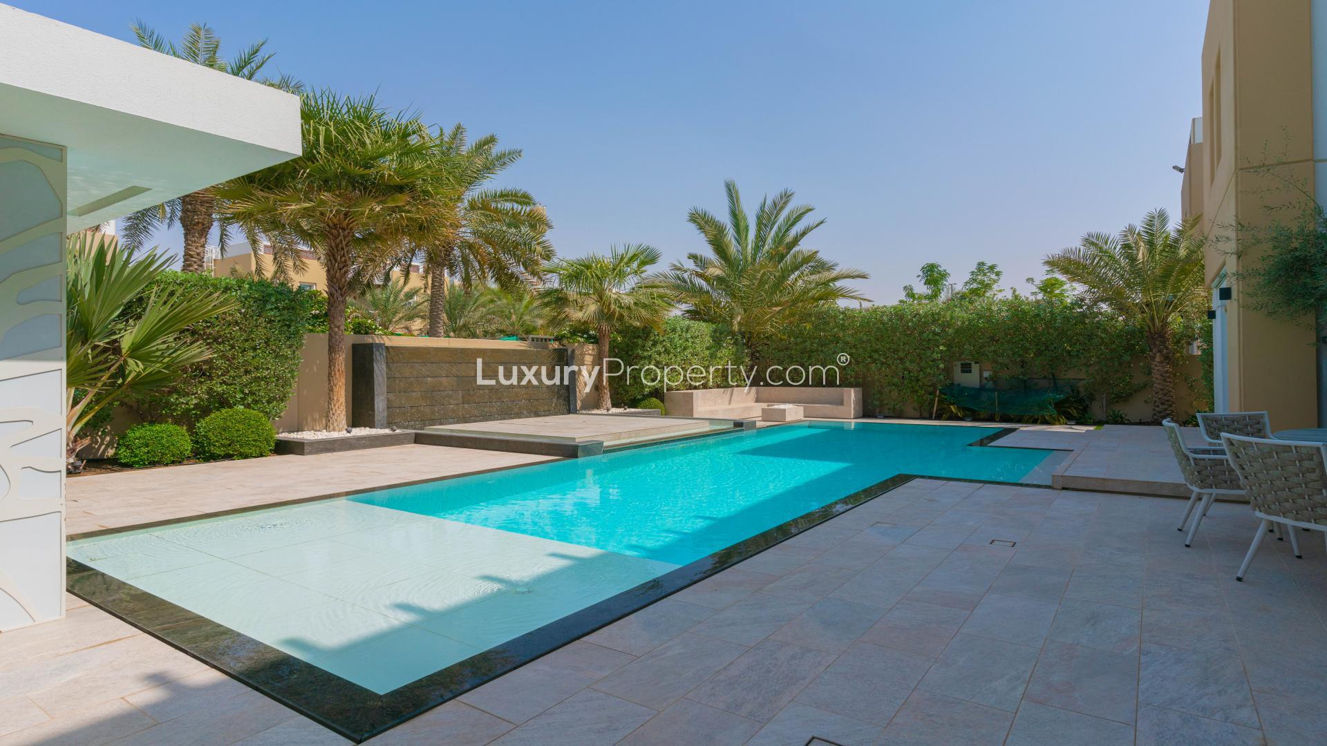 Luxurious villa with private pool in Rahat, Mudon community, featuring spacious outdoor area