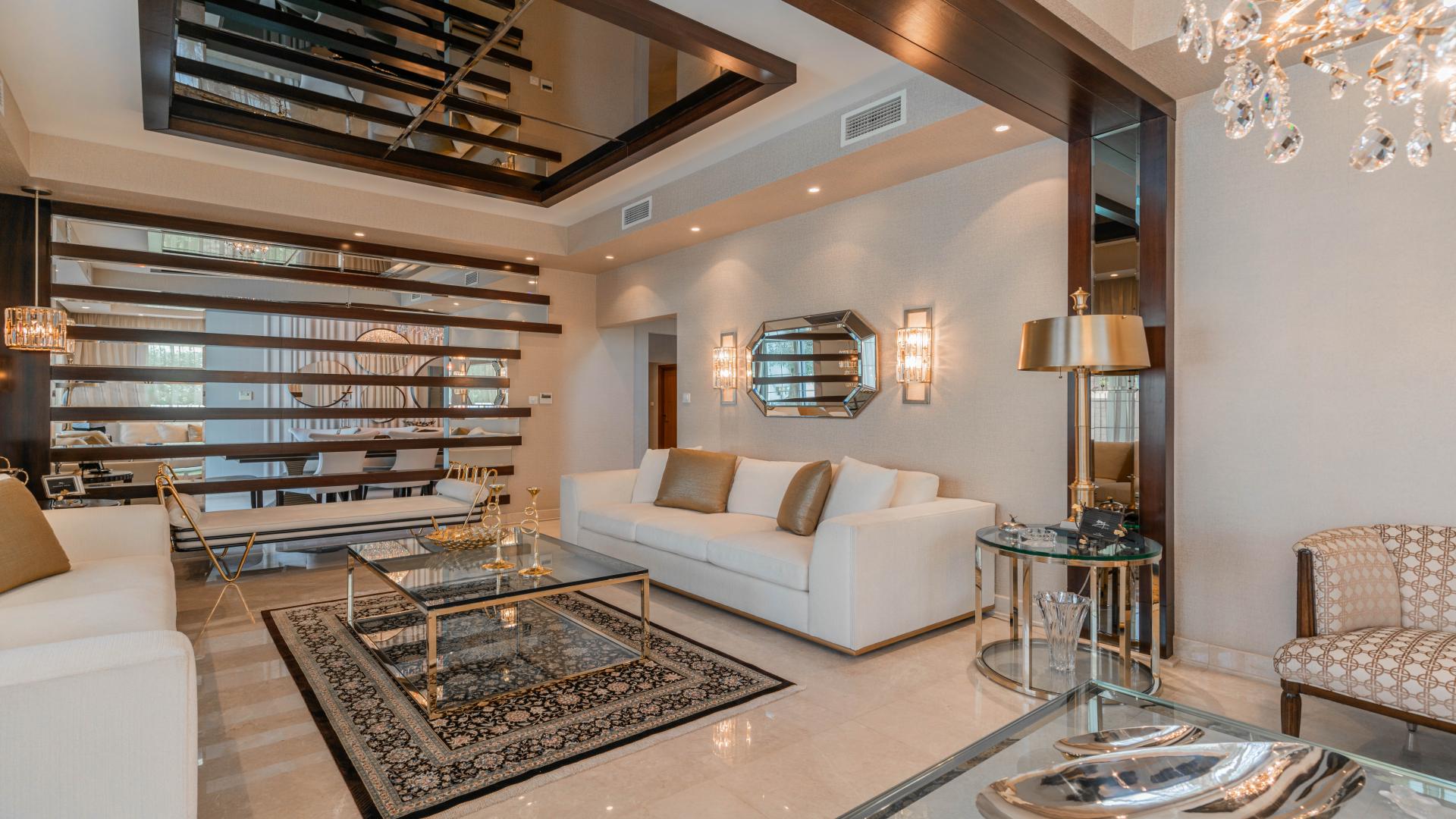 Luxurious living room in upgraded 5-bedroom villa, Rahat, Mudon community, spacious and elegant design