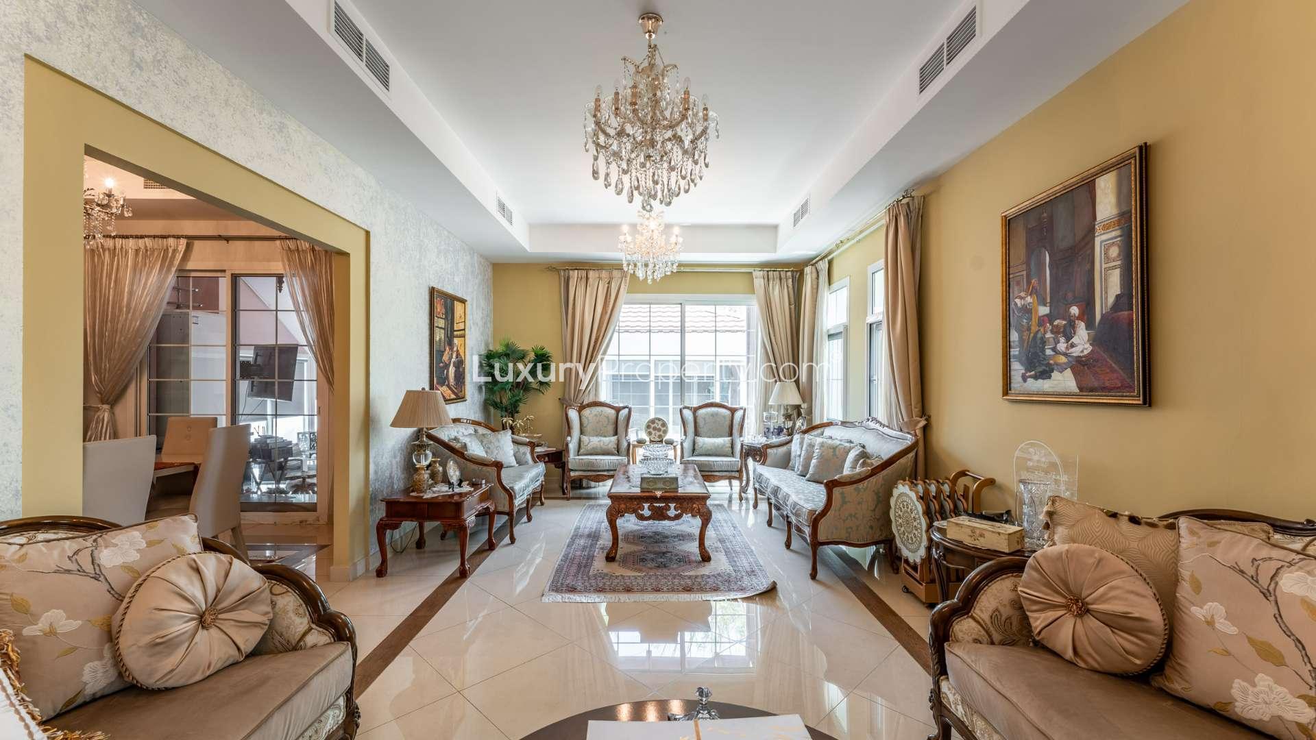"Elegant villa entrance with staircase in 5-bedroom Mudon Rahat property, LP21017 for sale.",N/A,Luxurious living room in 5-bedroom villa, Mudon Rahat, featuring elegant furnishings and chandeliers