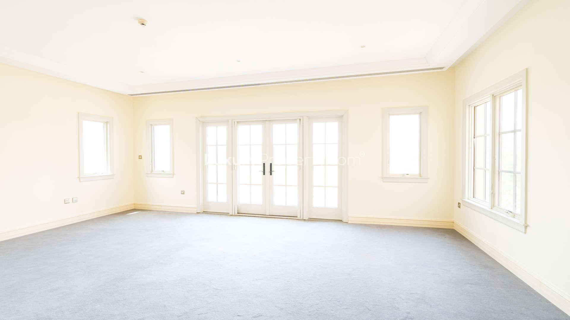 Bright hallway with archways in five-bedroom villa, Redwood Avenue, Jumeirah Golf Estates