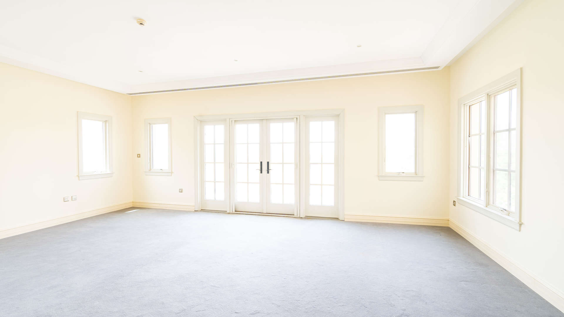 Bright hallway with archways in five-bedroom villa, Redwood Avenue, Jumeirah Golf Estates