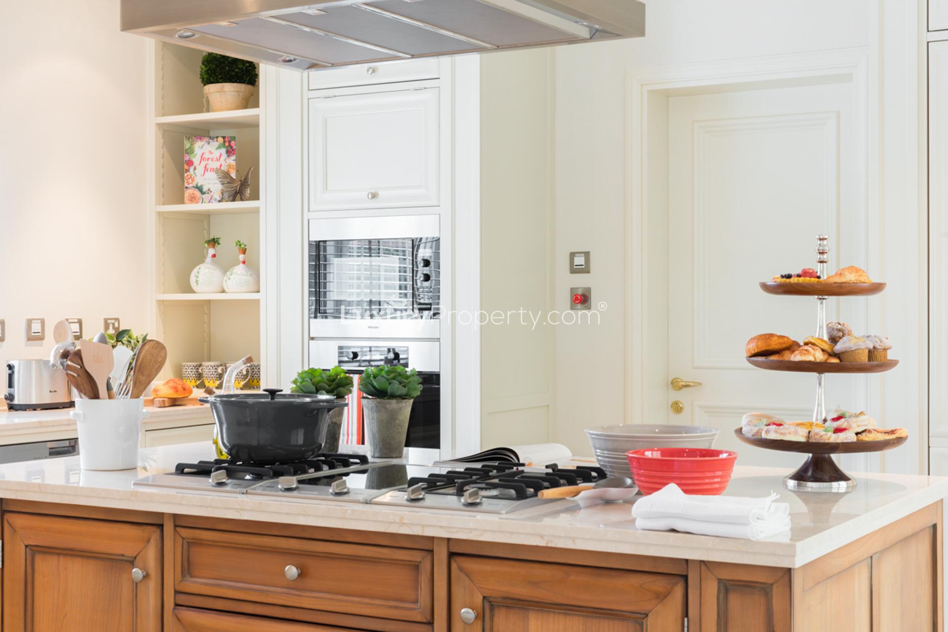 Luxurious kitchen in Jersey Type Villa, Jumeirah Golf Estates, with modern appliances and decor