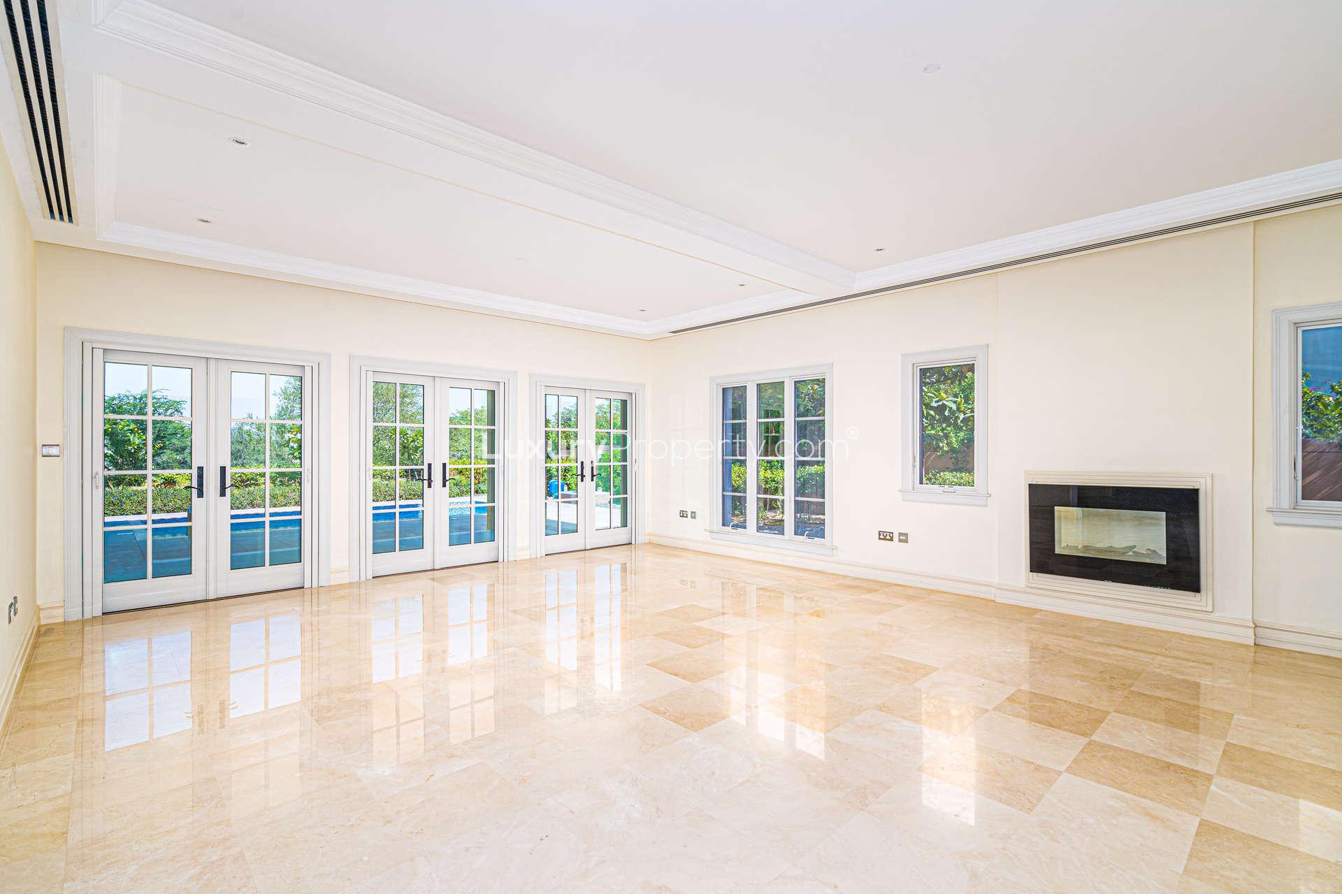 Spacious living area in five-bedroom villa, Redwood Avenue, Jumeirah Golf Estates, for sale