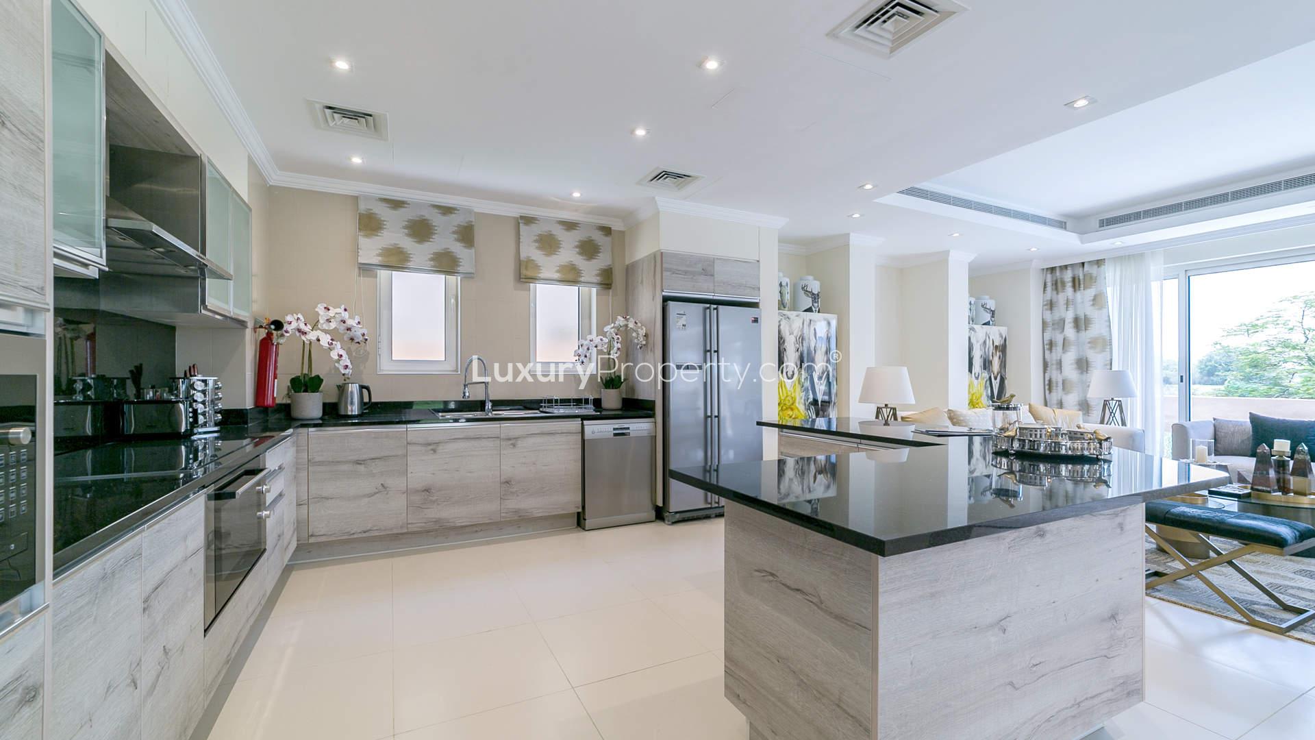 Open-plan living area in five-bed villa, Sienna Views, Jumeirah Golf Estates. Bright and spacious