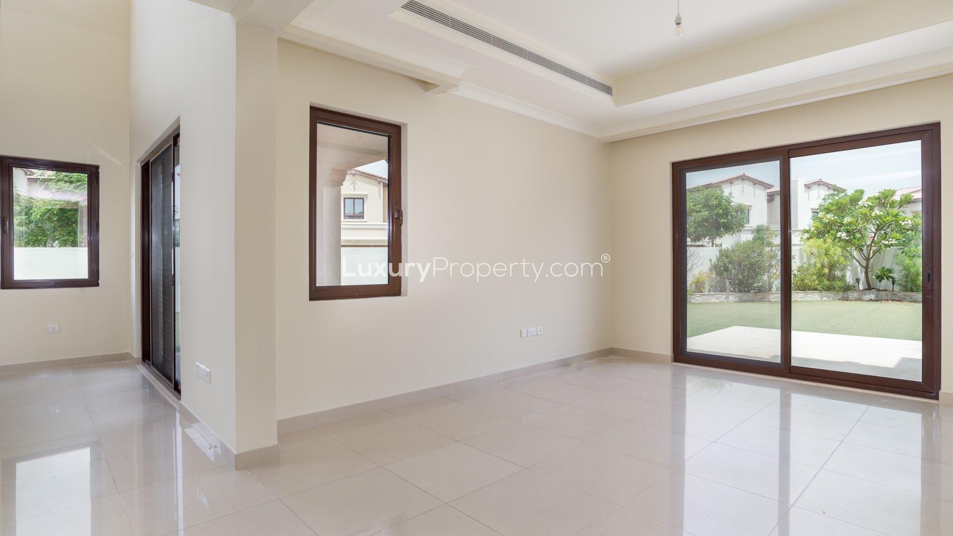 Bright living room with garden view in Rosa villa, Arabian Ranches 2