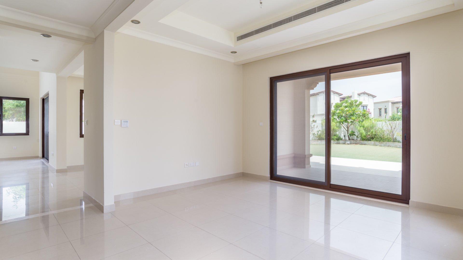Elegant 5-bedroom villa exterior in Rosa, Arabian Ranches 2, with lush landscaping