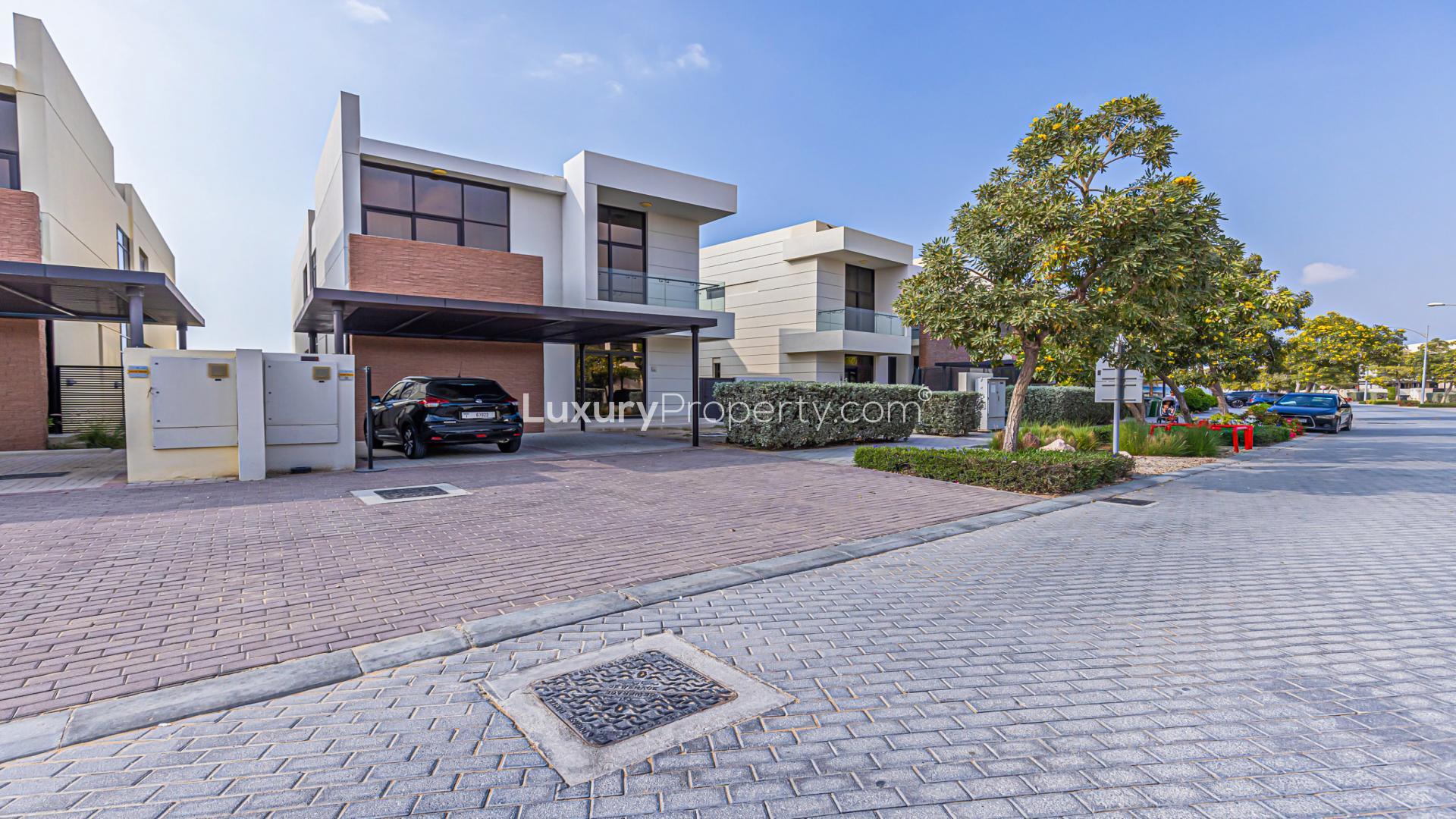 Luxurious living room in fully furnished villa, Damac Hills, Flora community, golf course view